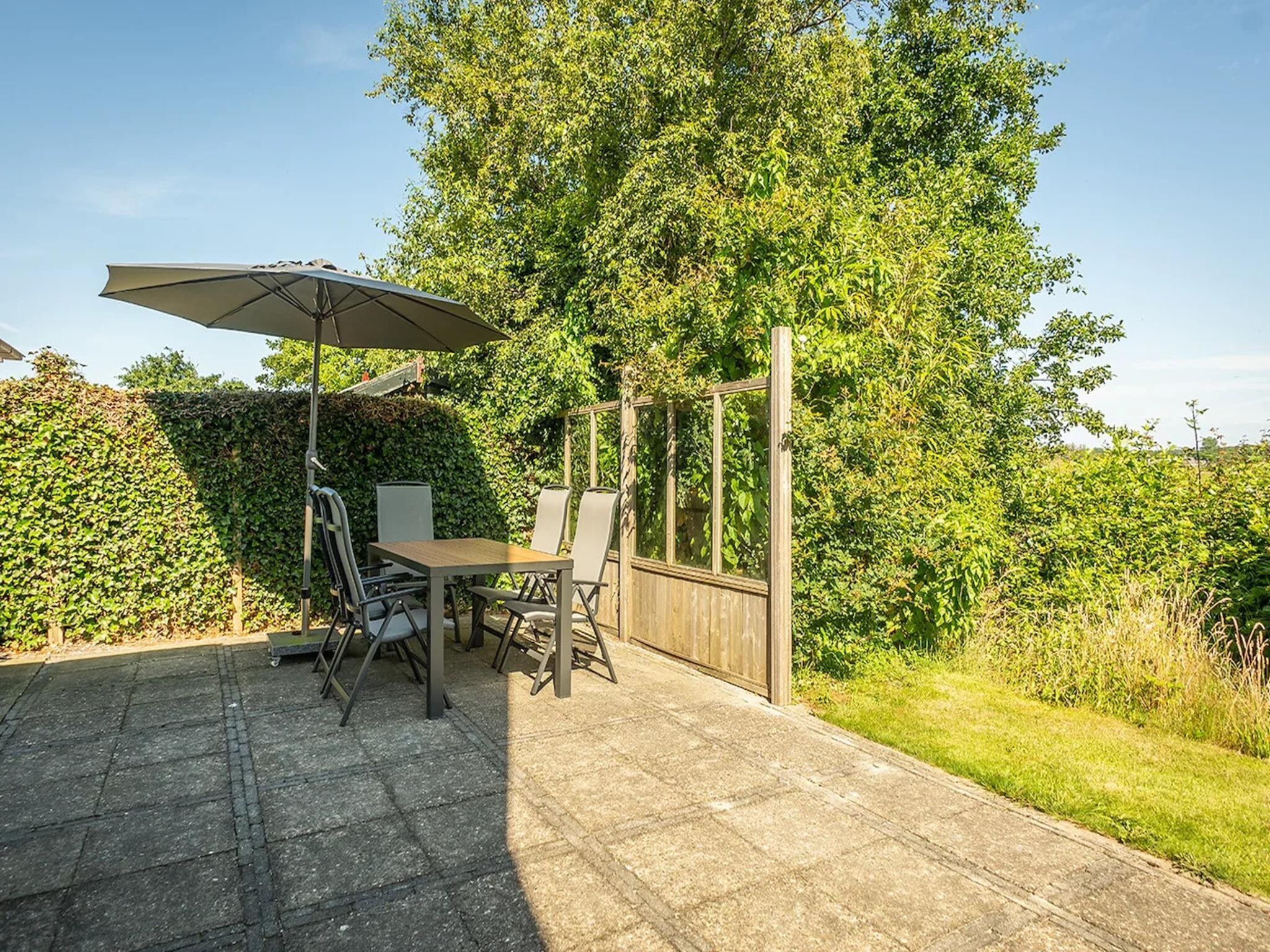 Het terras van 5-person luxury holiday villa on Texel in De Koog