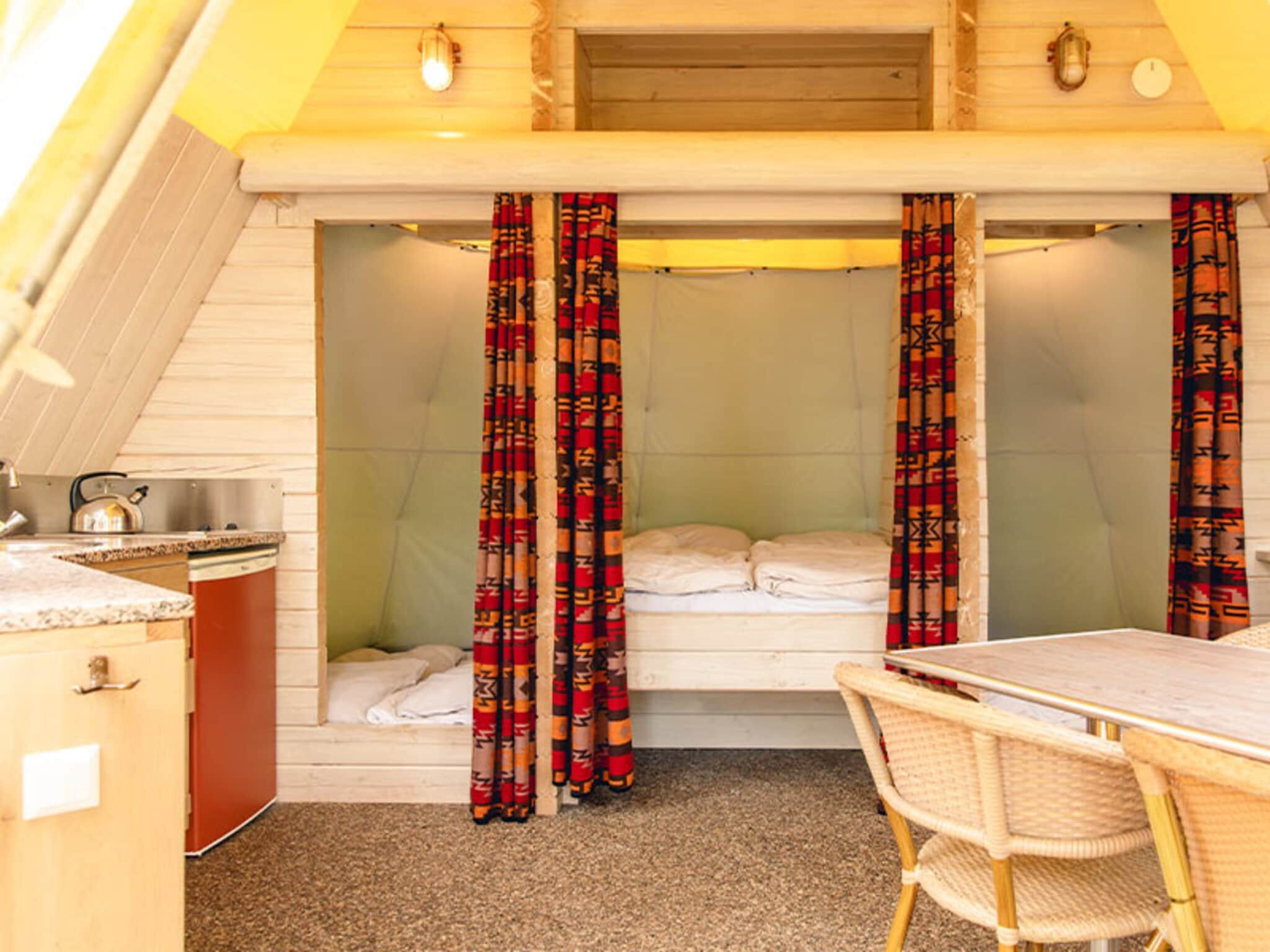 Een slaapkamer van Wigwam Deluxe in Slagharen