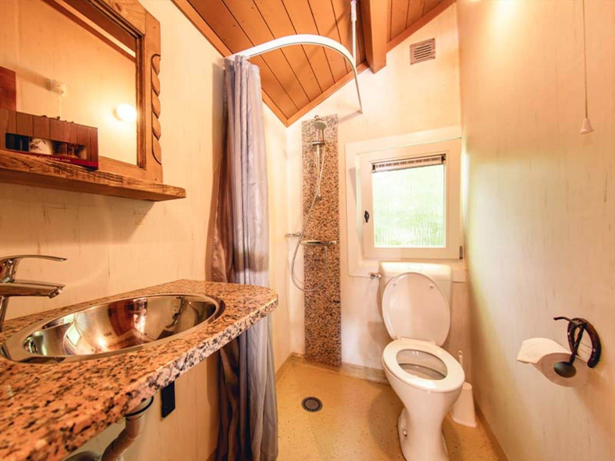 De badkamer van Cowboy Cottage in Slagharen