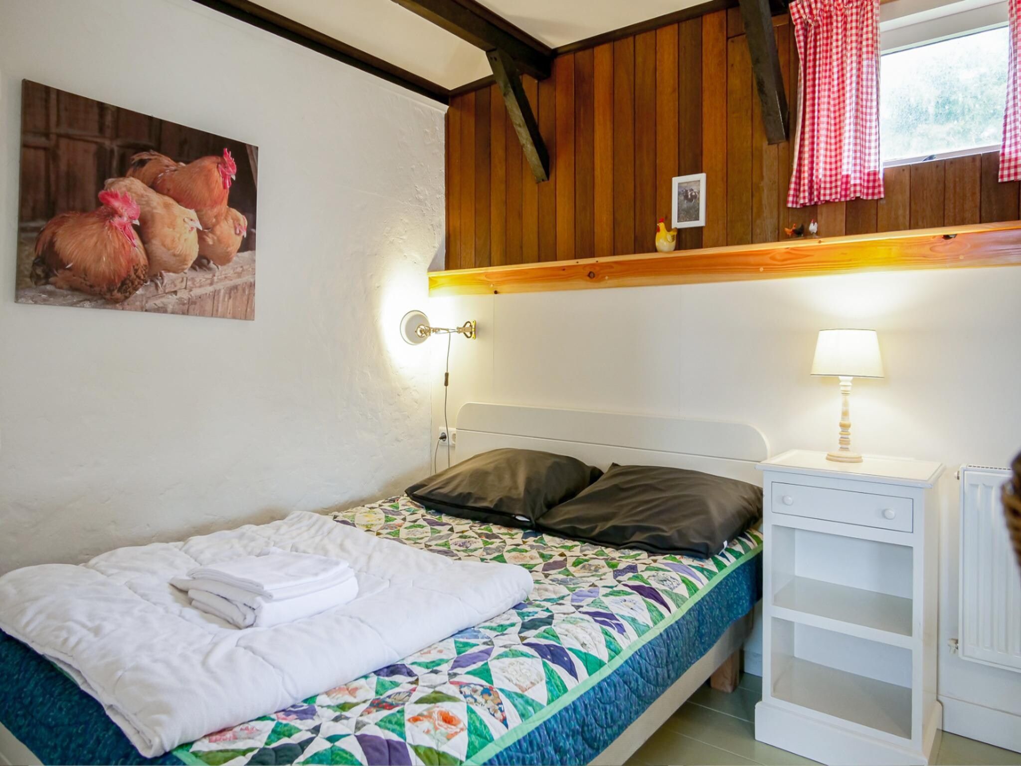 Een slaapkamer van Suite Koeboet in Callantsoog