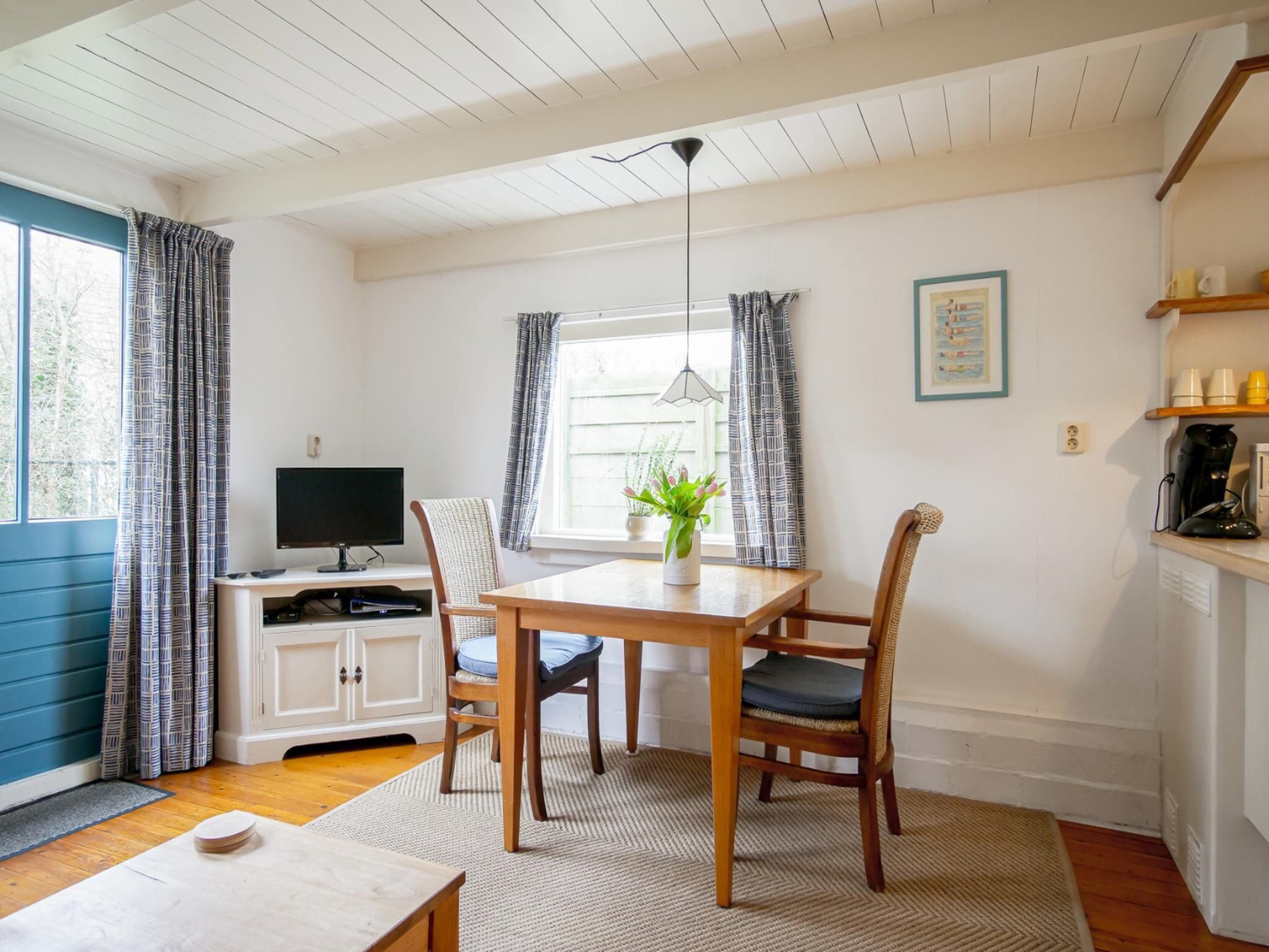 De eetkamer van Appartement Eb in Callantsoog