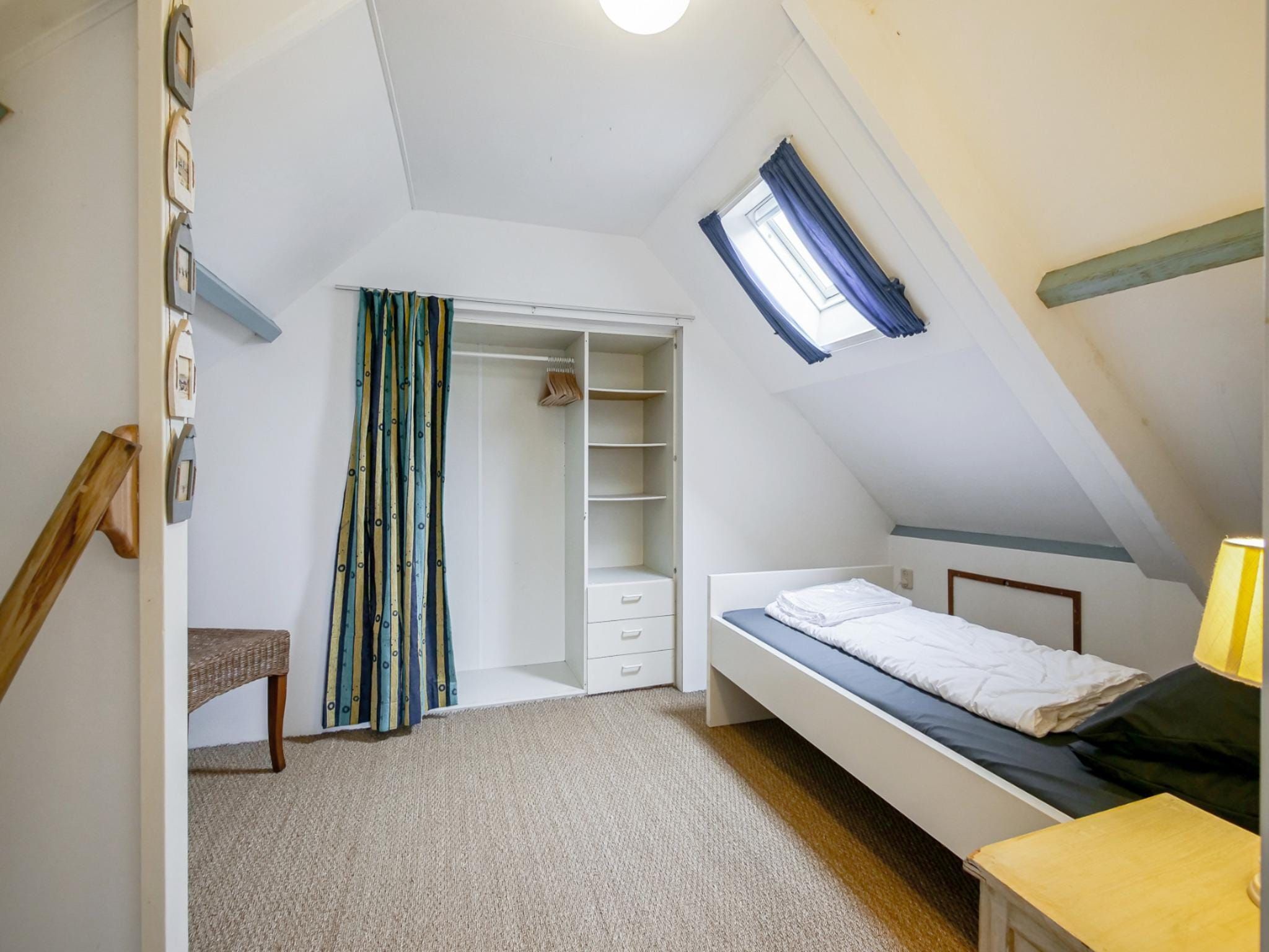 Een slaapkamer van Appartement Eb in Callantsoog