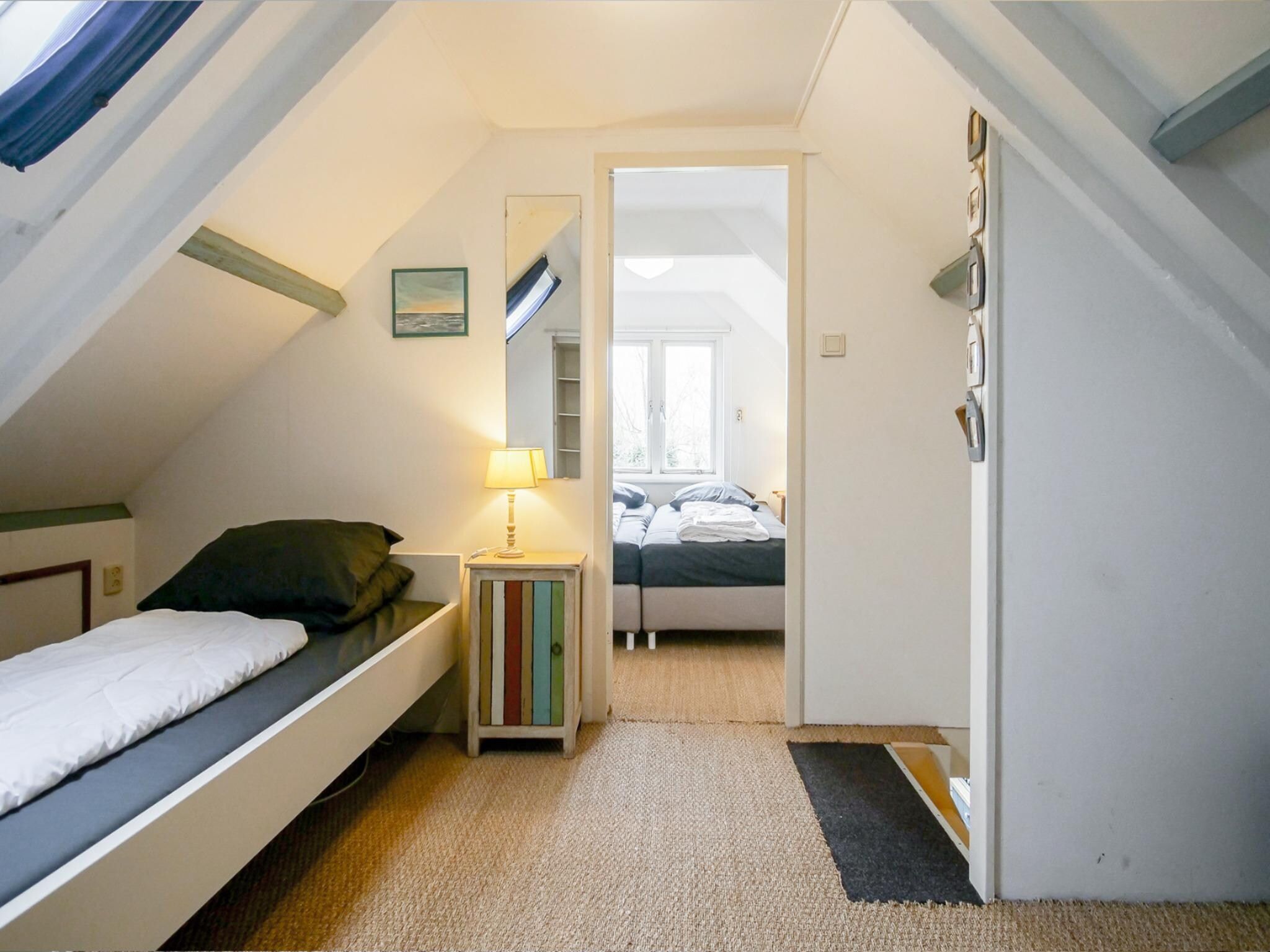 Een slaapkamer van Appartement Eb in Callantsoog