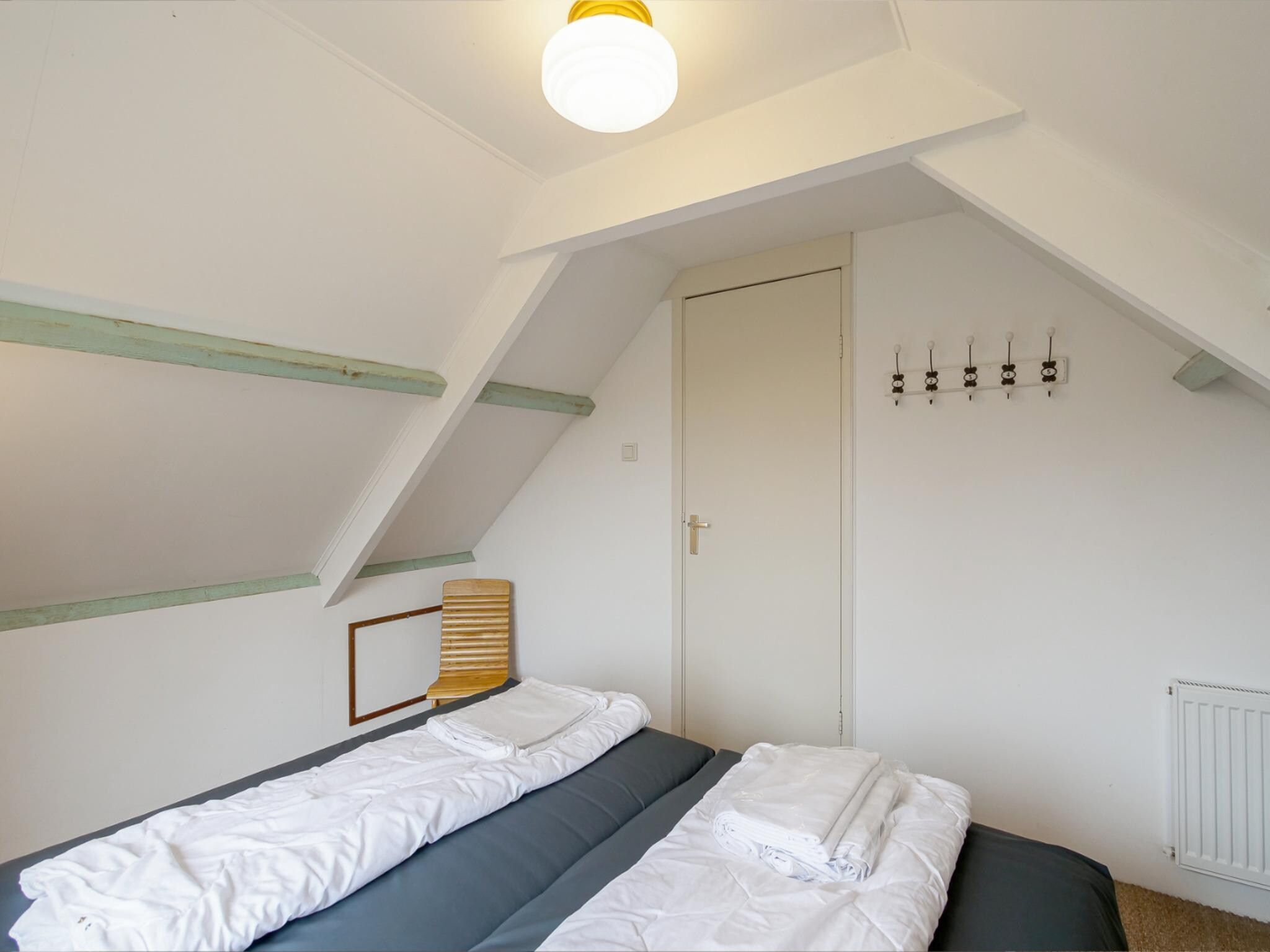 Een slaapkamer van Appartement Eb in Callantsoog