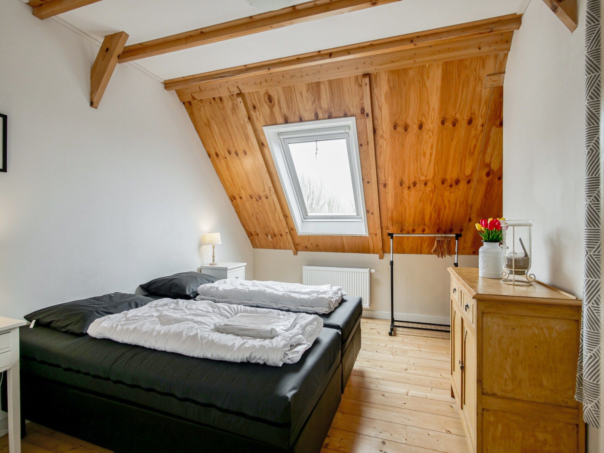 Een slaapkamer van Appartement Dars in Callantsoog