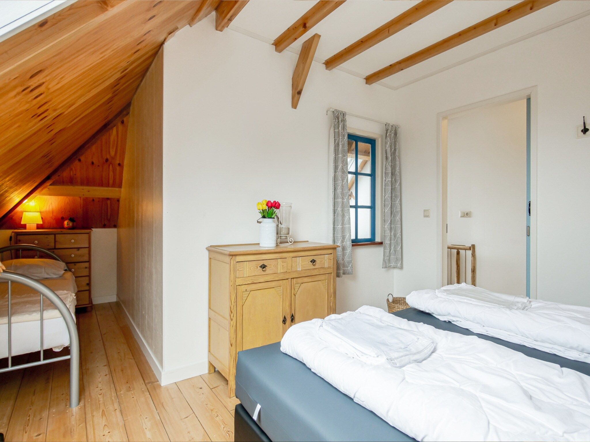 Een slaapkamer van Appartement Dars in Callantsoog