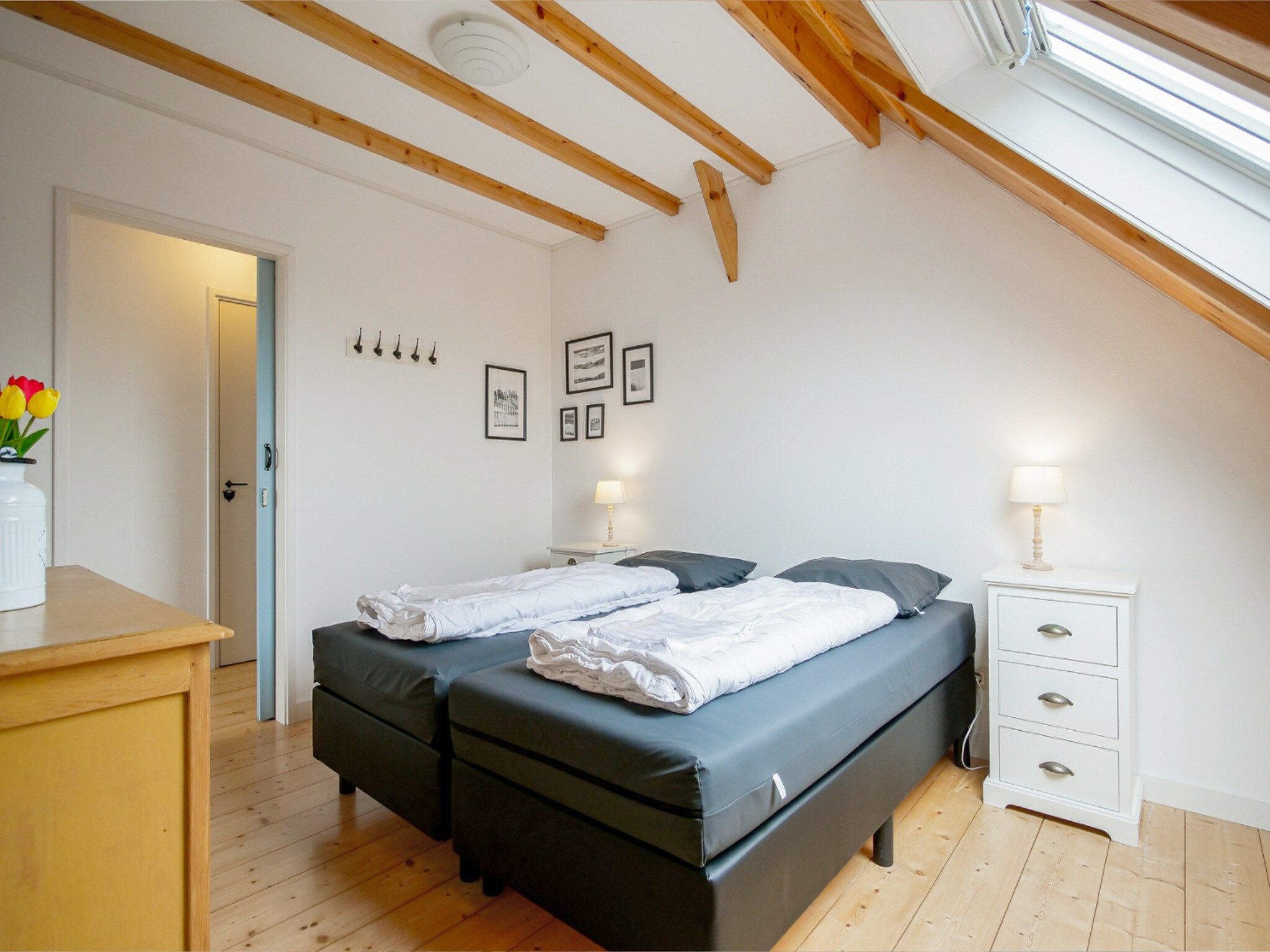 Een slaapkamer van Appartement Dars in Callantsoog