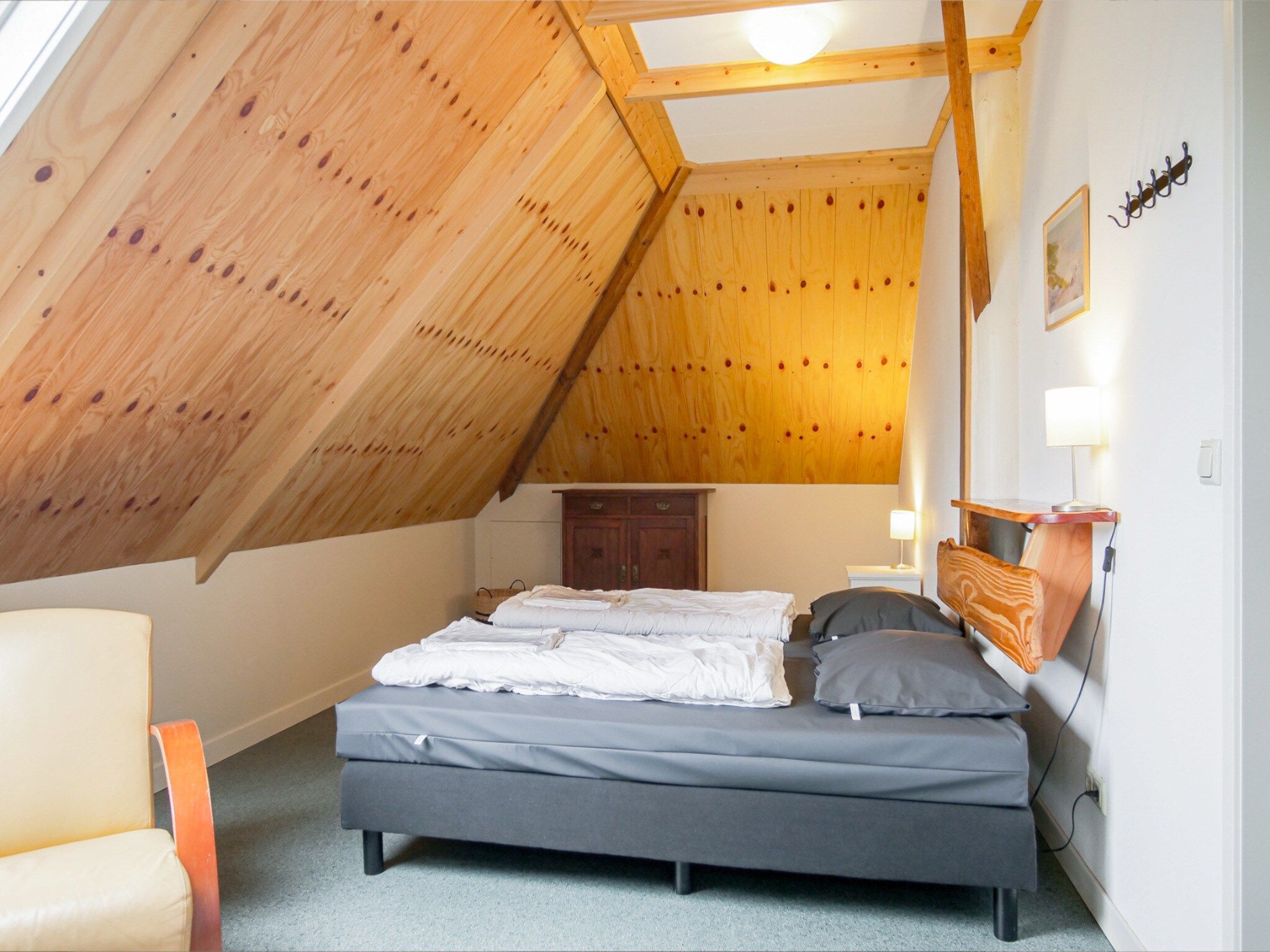 Een slaapkamer van Appartement Dars in Callantsoog
