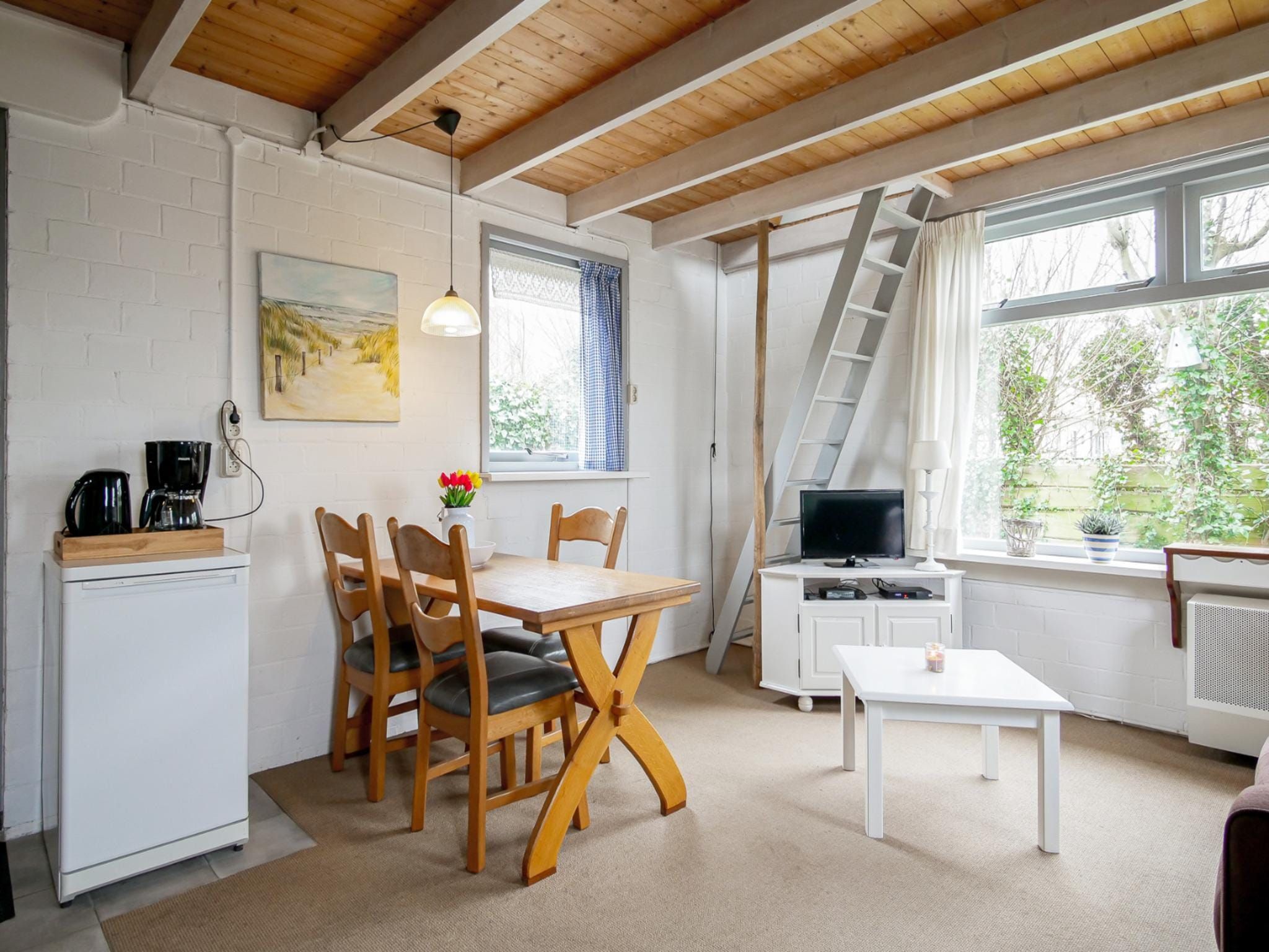 De eetkamer van Vakantiehuisje Vloed in Callantsoog