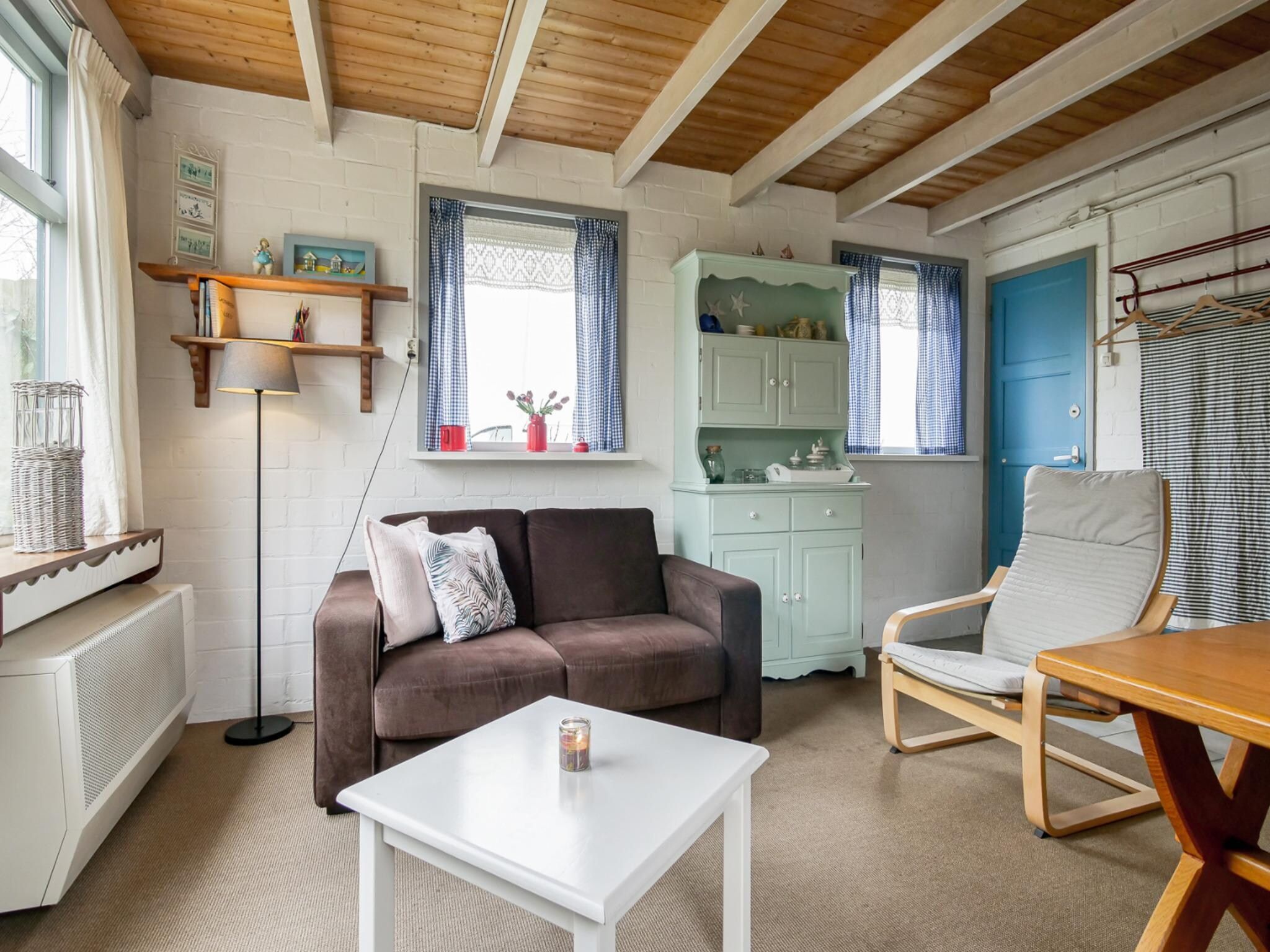 De woonkamer van Vakantiehuisje Vloed in Callantsoog