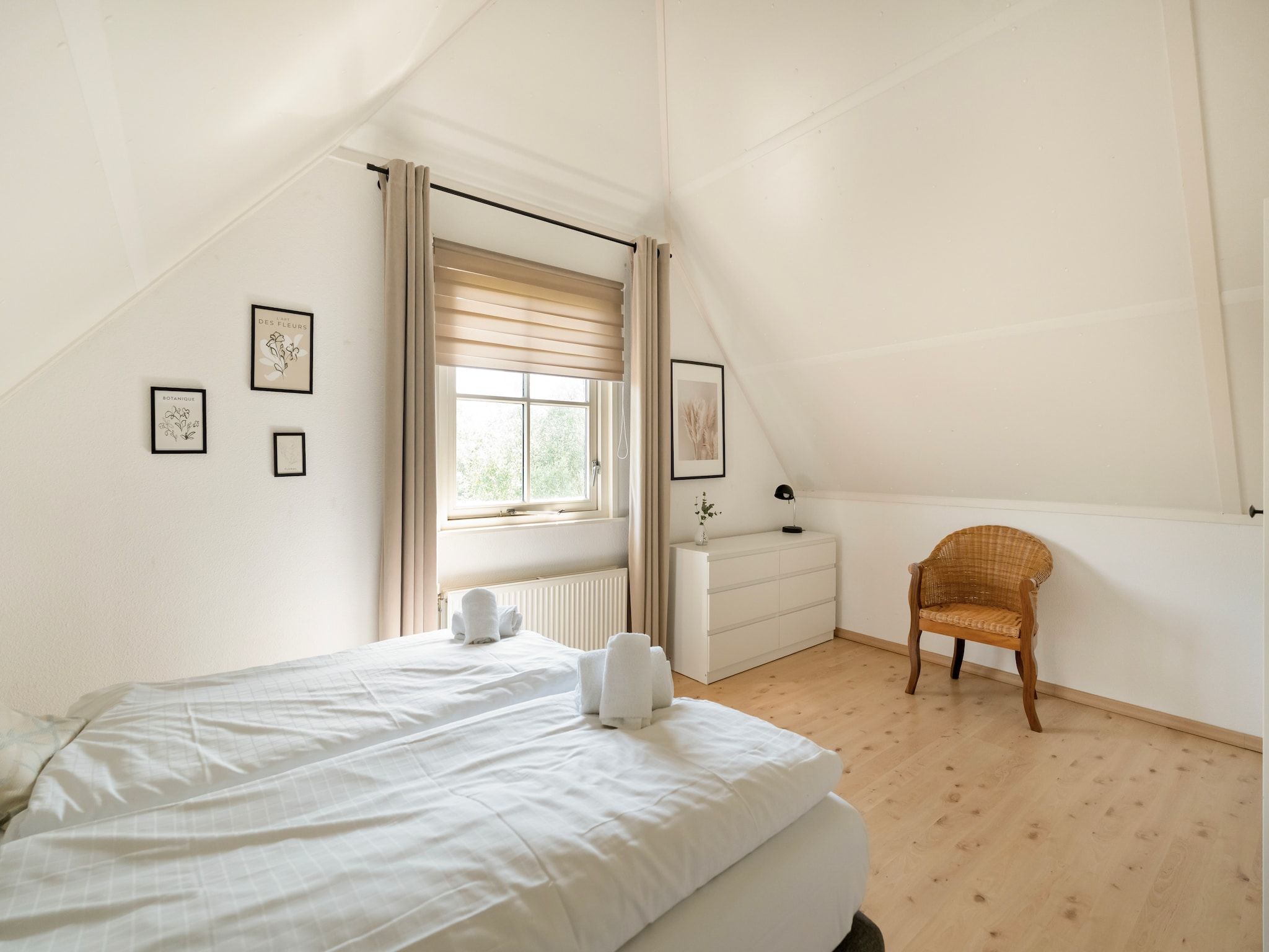 Een slaapkamer van De Buitenplaats 150 in Callantsoog