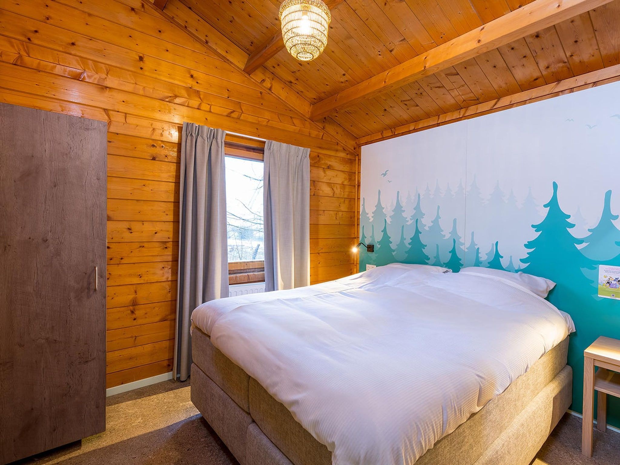 Een slaapkamer van Molletjes Boshut 6p in Hoogerheide