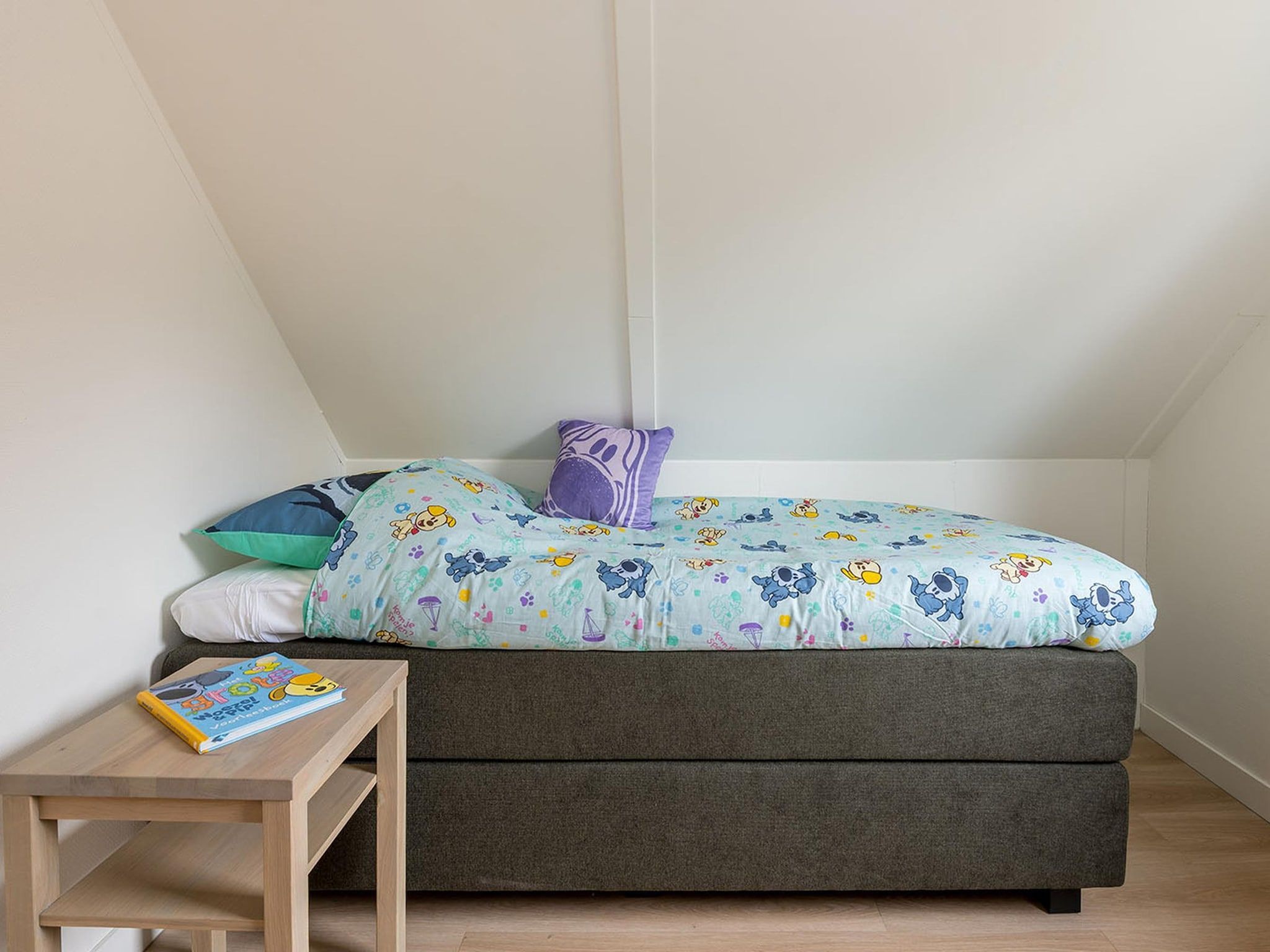 Een slaapkamer van Buurpoes Villa 7p in Hoogerheide