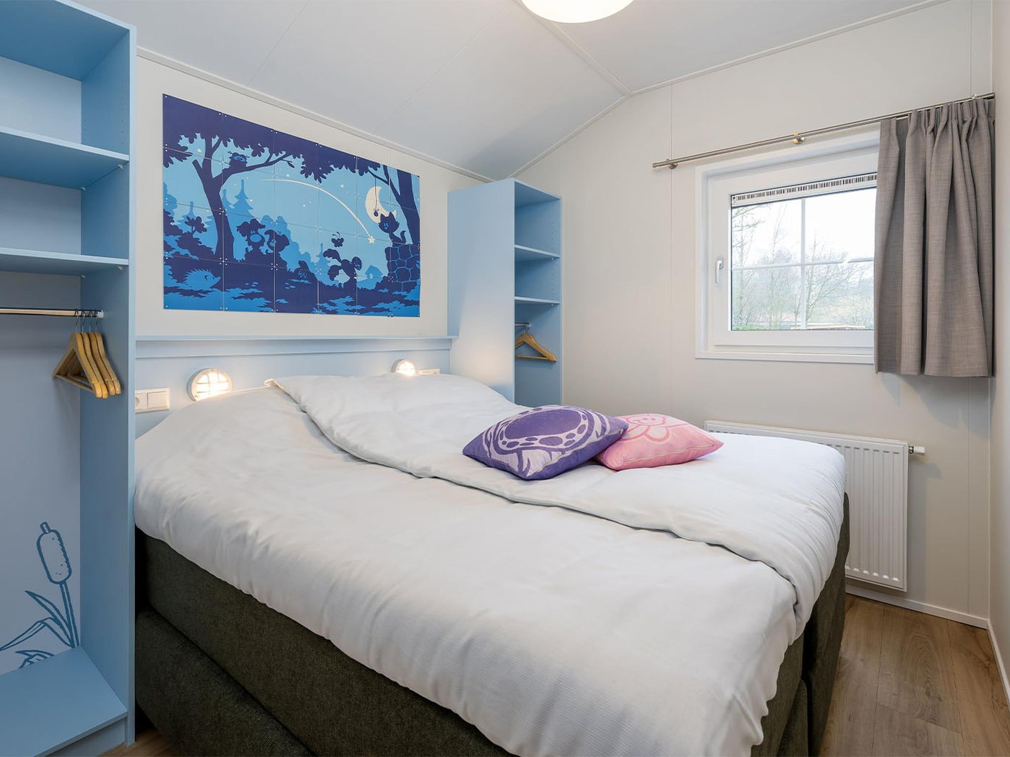 Een slaapkamer van Vlindertjes Venhuis 5p in Hoogerheide