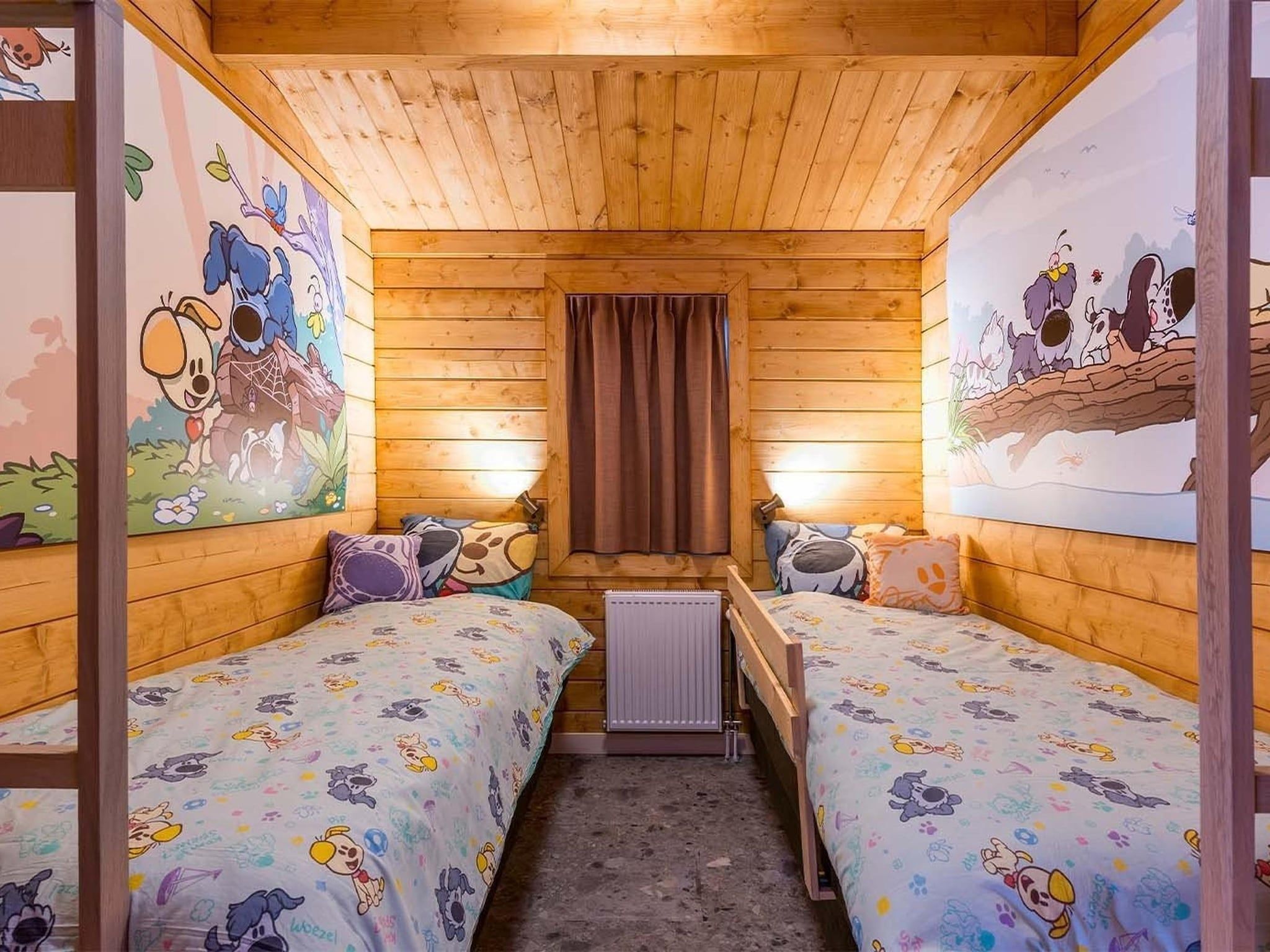 Een slaapkamer van Woezel & Pip Lodge 6p - Met Speelkamer in Hoogerheide