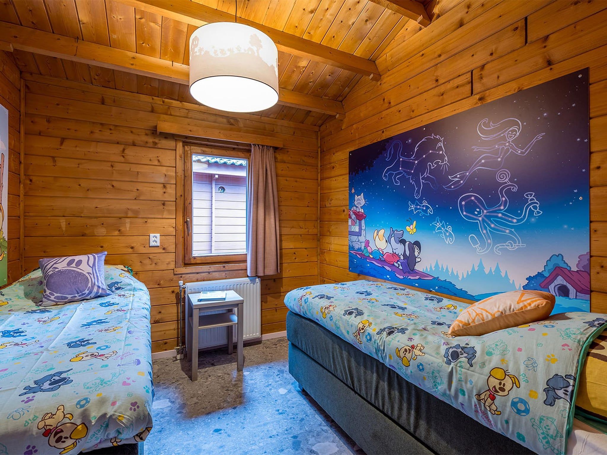 Een slaapkamer van Wijze Varen Lodge 6p in Hoogerheide