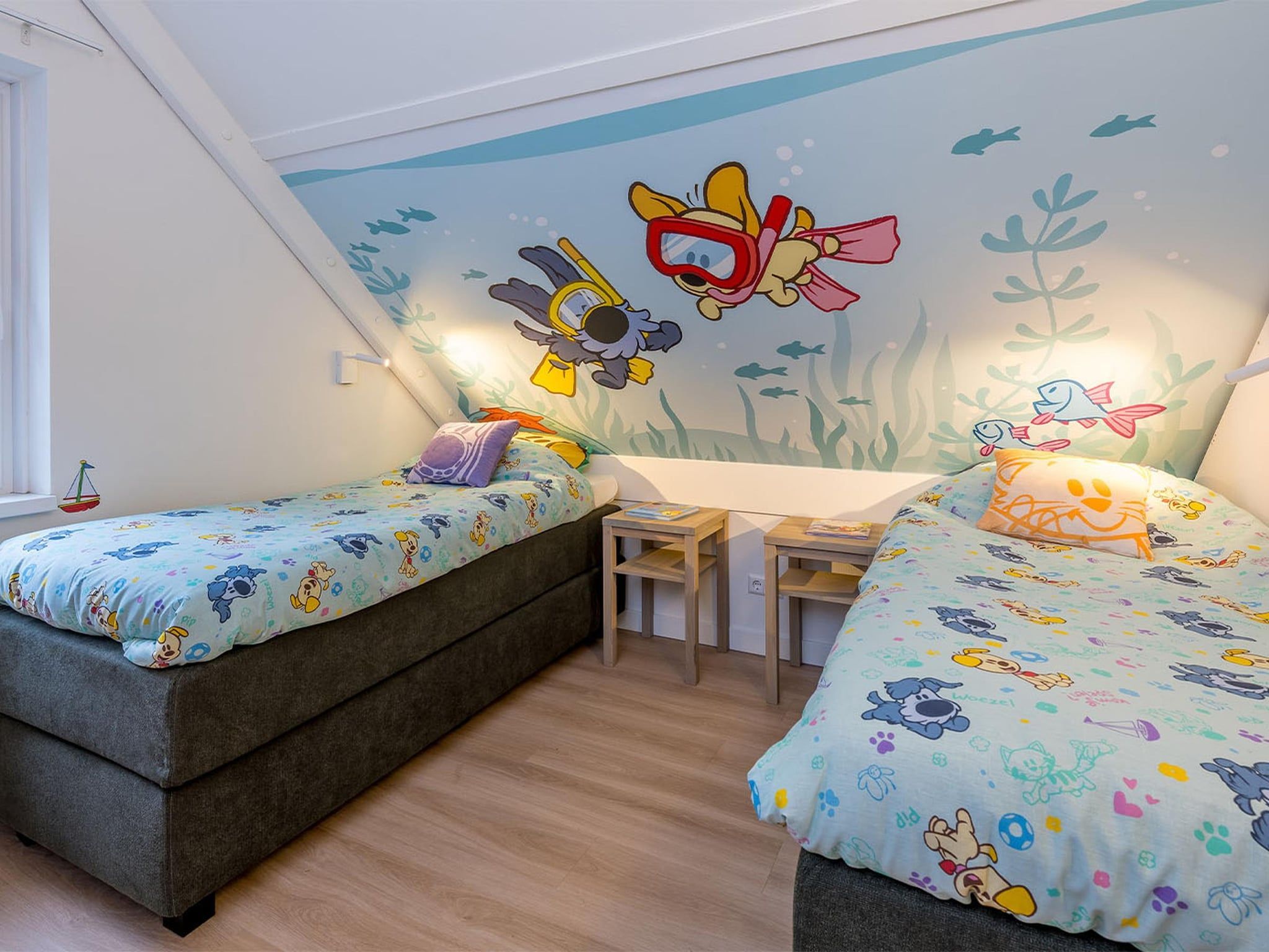 Een slaapkamer van Woezel & Pip Villa 8p in Hoogerheide