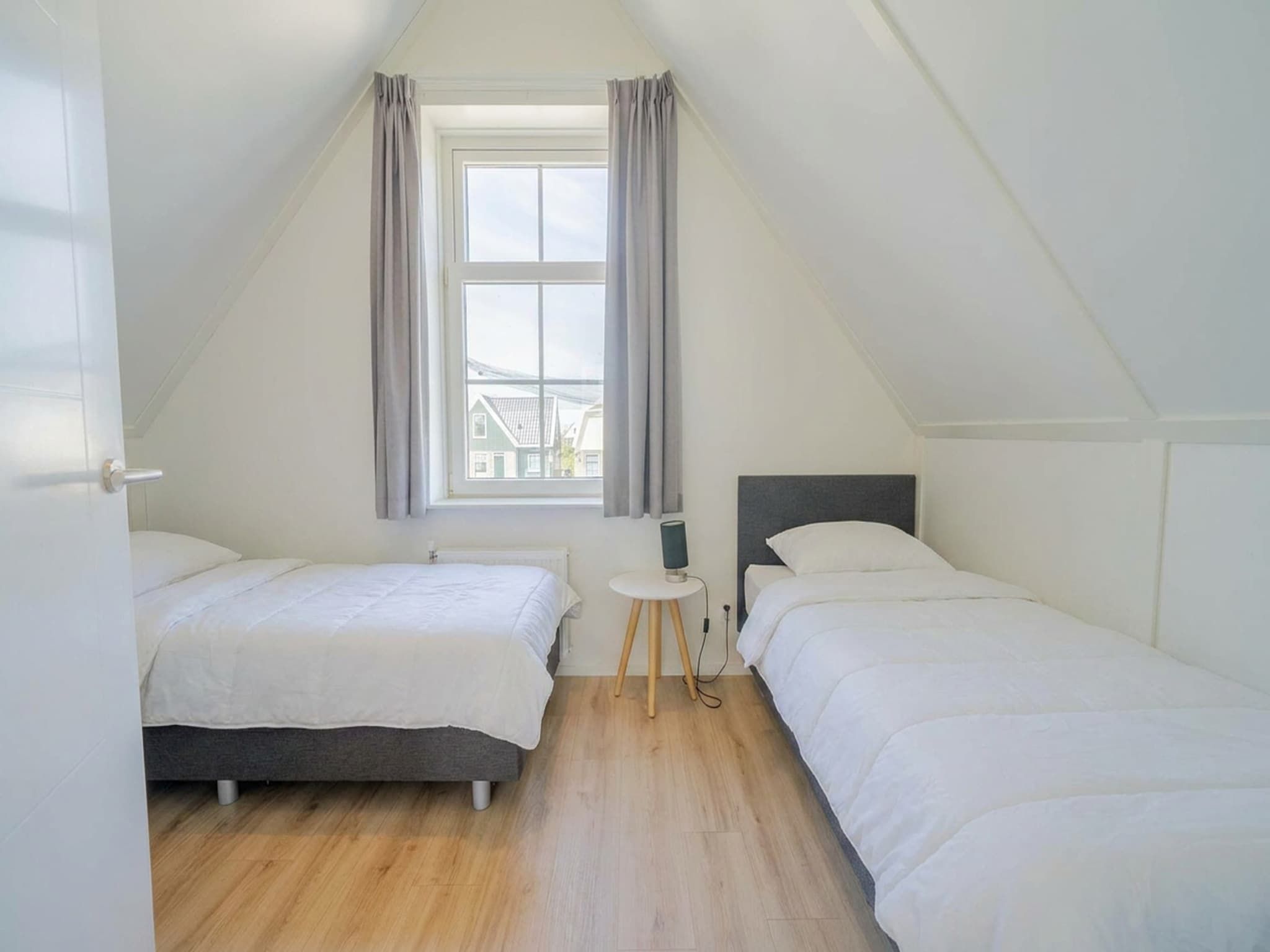 Een slaapkamer van Florijn 6 in Uitdam