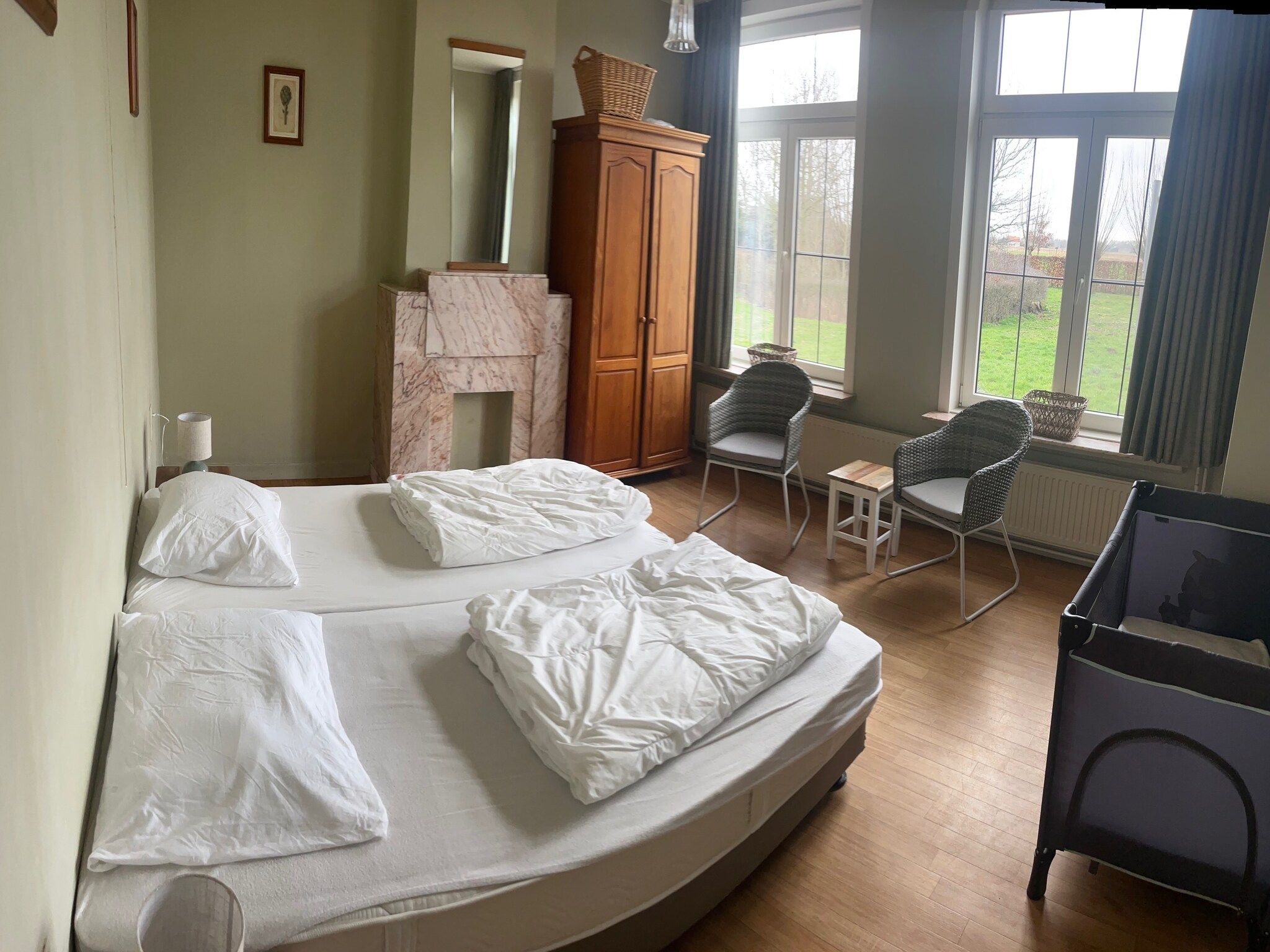Een slaapkamer van De Biezenpolder 't Groothuus in Eede