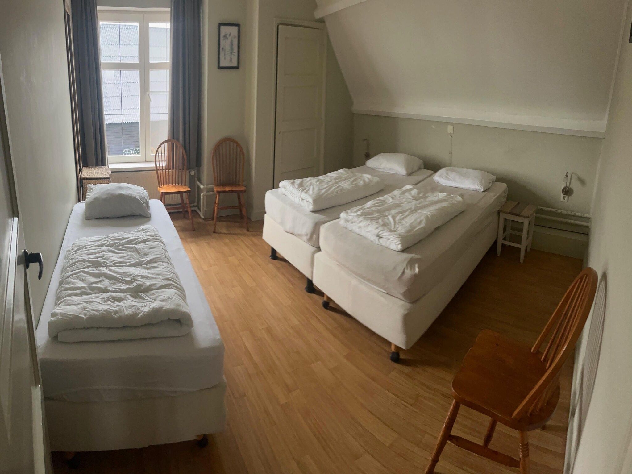 Een slaapkamer van De Biezenpolder 't Groothuus in Eede