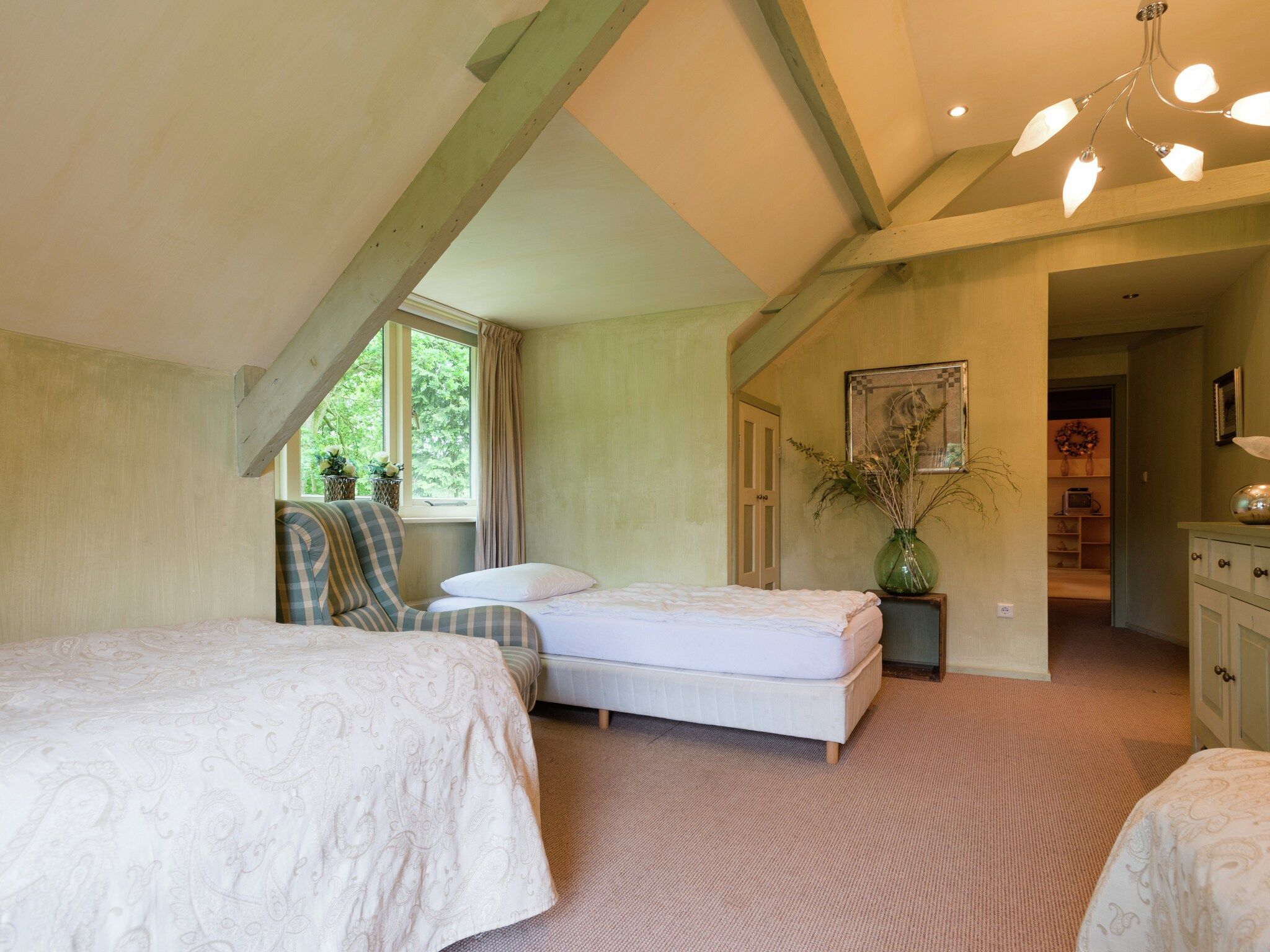 Een slaapkamer van De Eekhorst in Balkbrug