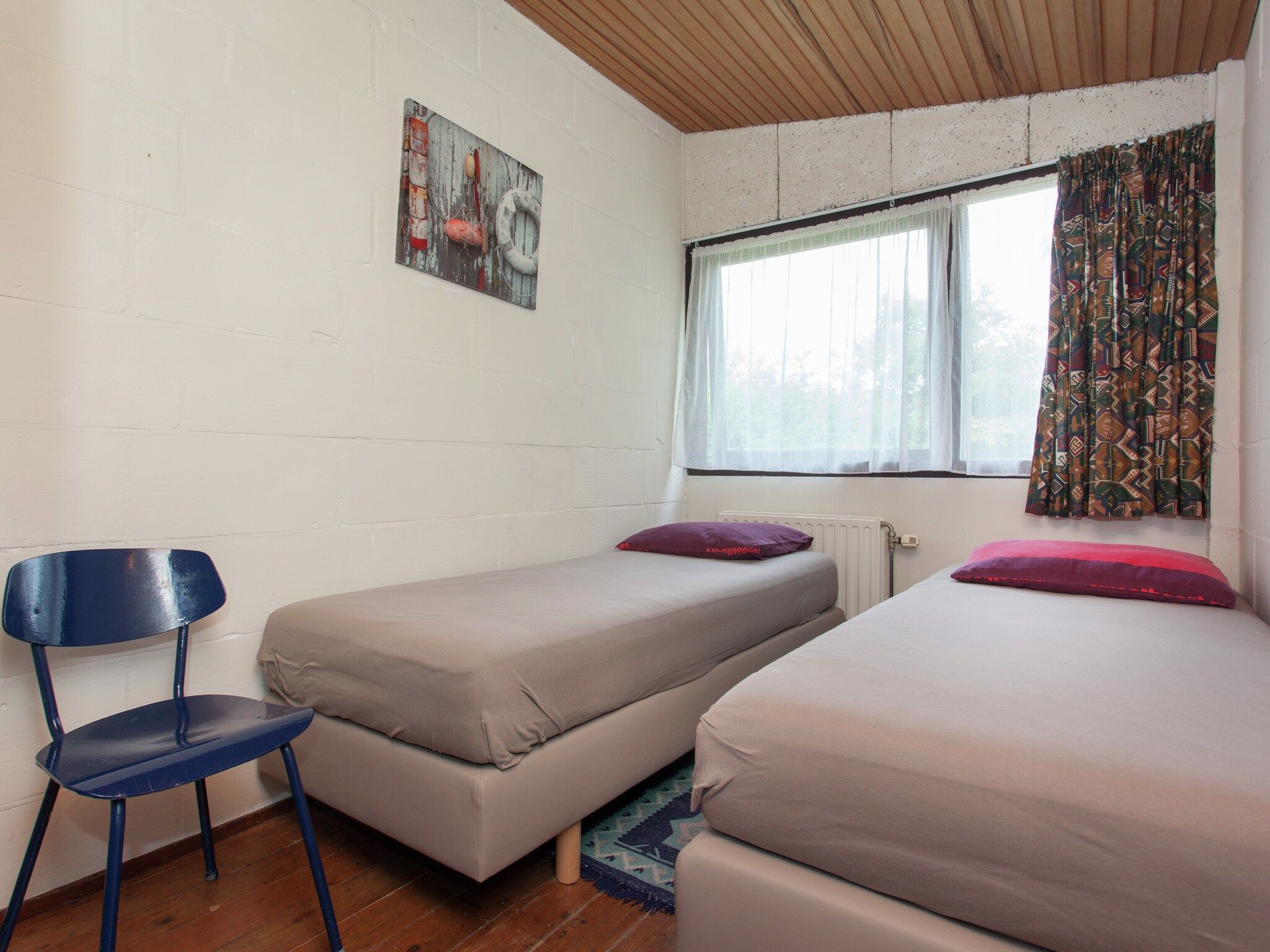 Een slaapkamer van Skries in Nes Ameland