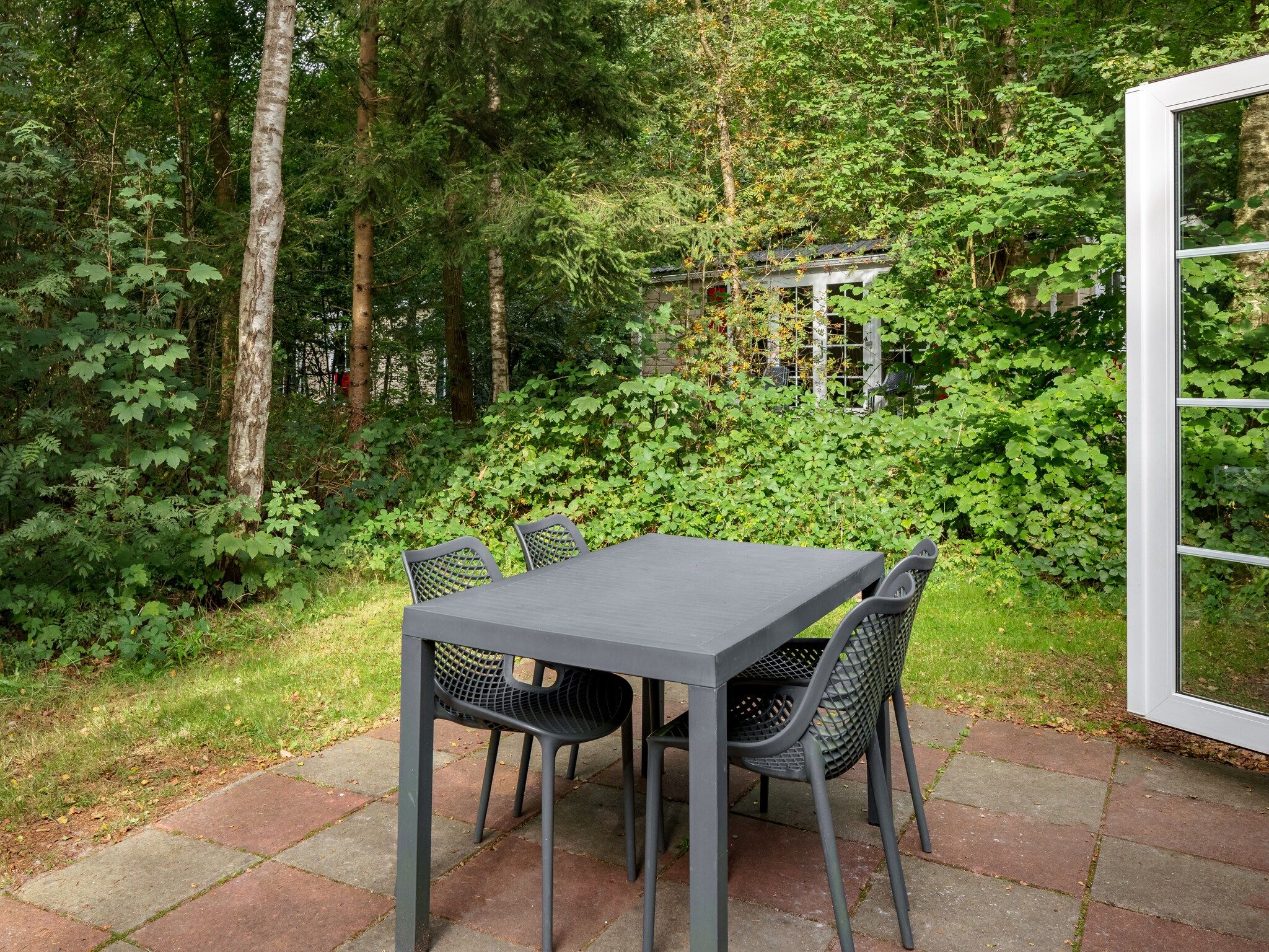 Het terras van Bospark Lunsbergen 5 in Borger