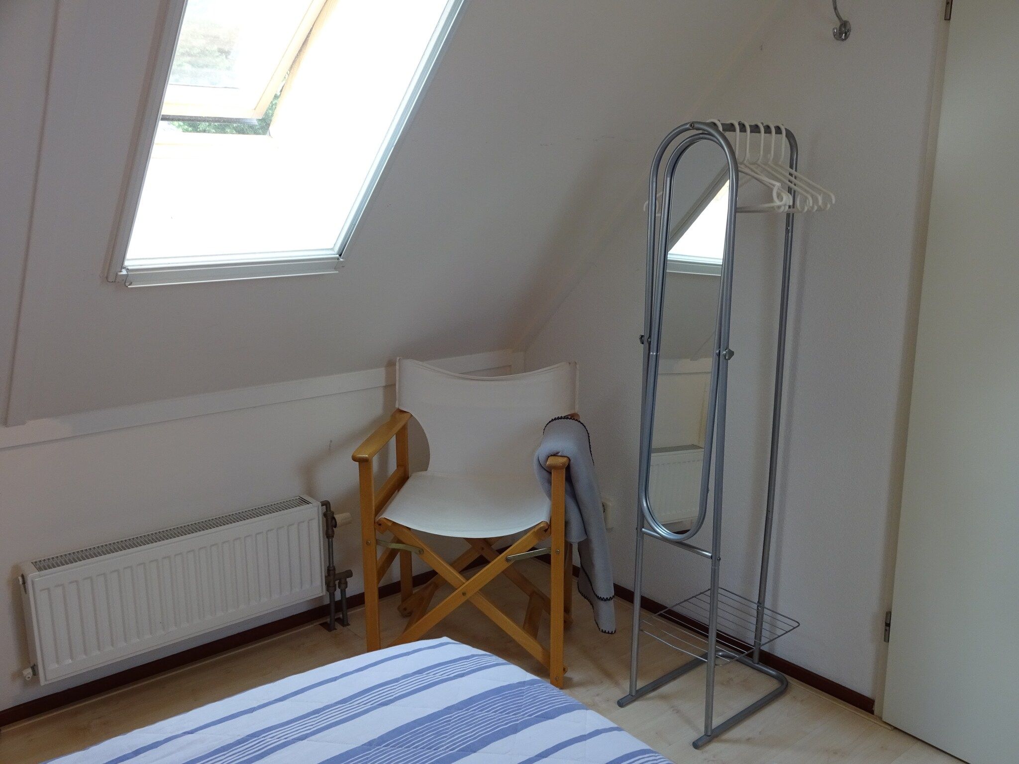 Een slaapkamer van Villa ten Hoeve in Steendam