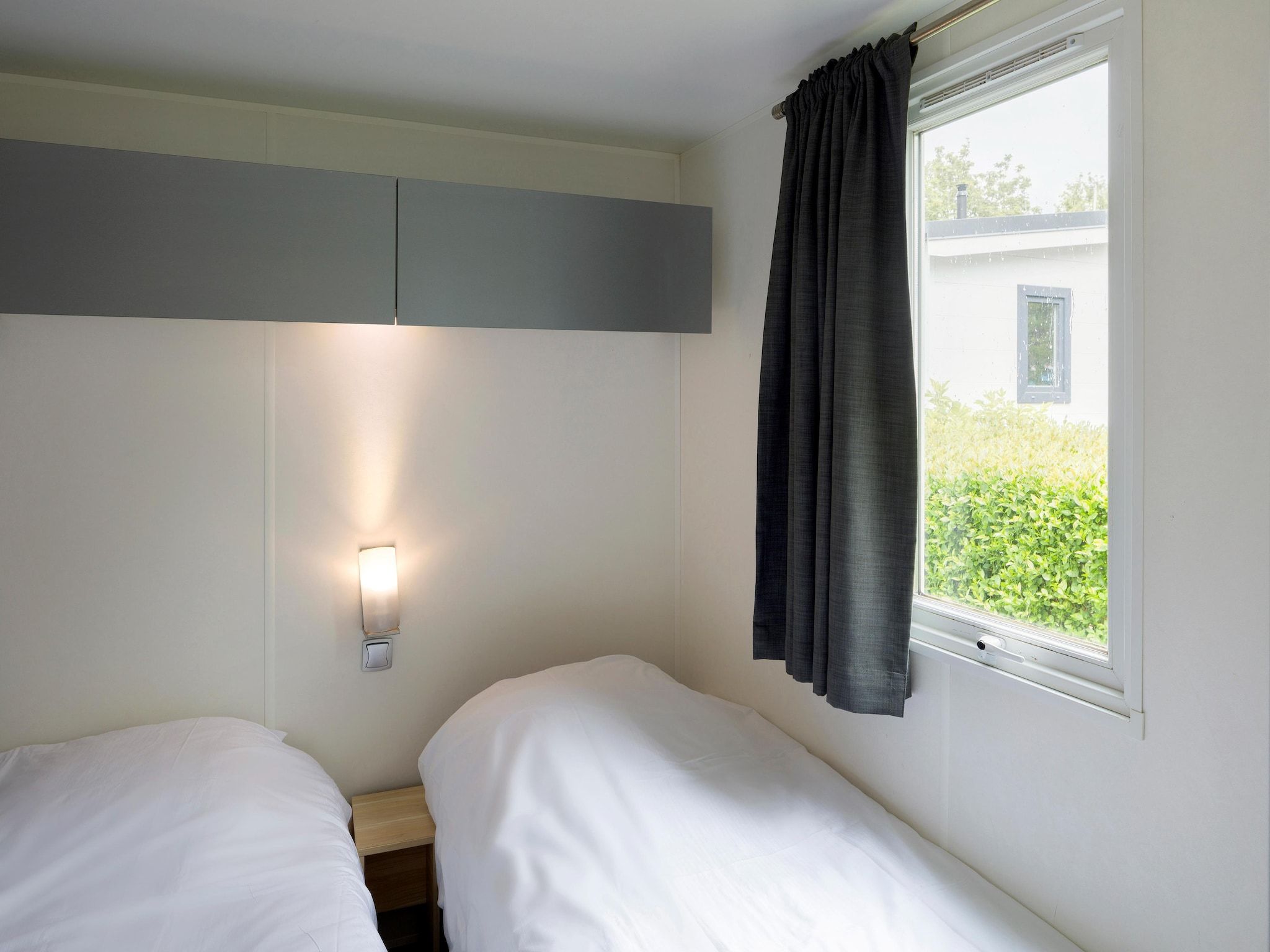 Een slaapkamer van Vakantiepark Beach Resort 2 in Kamperland