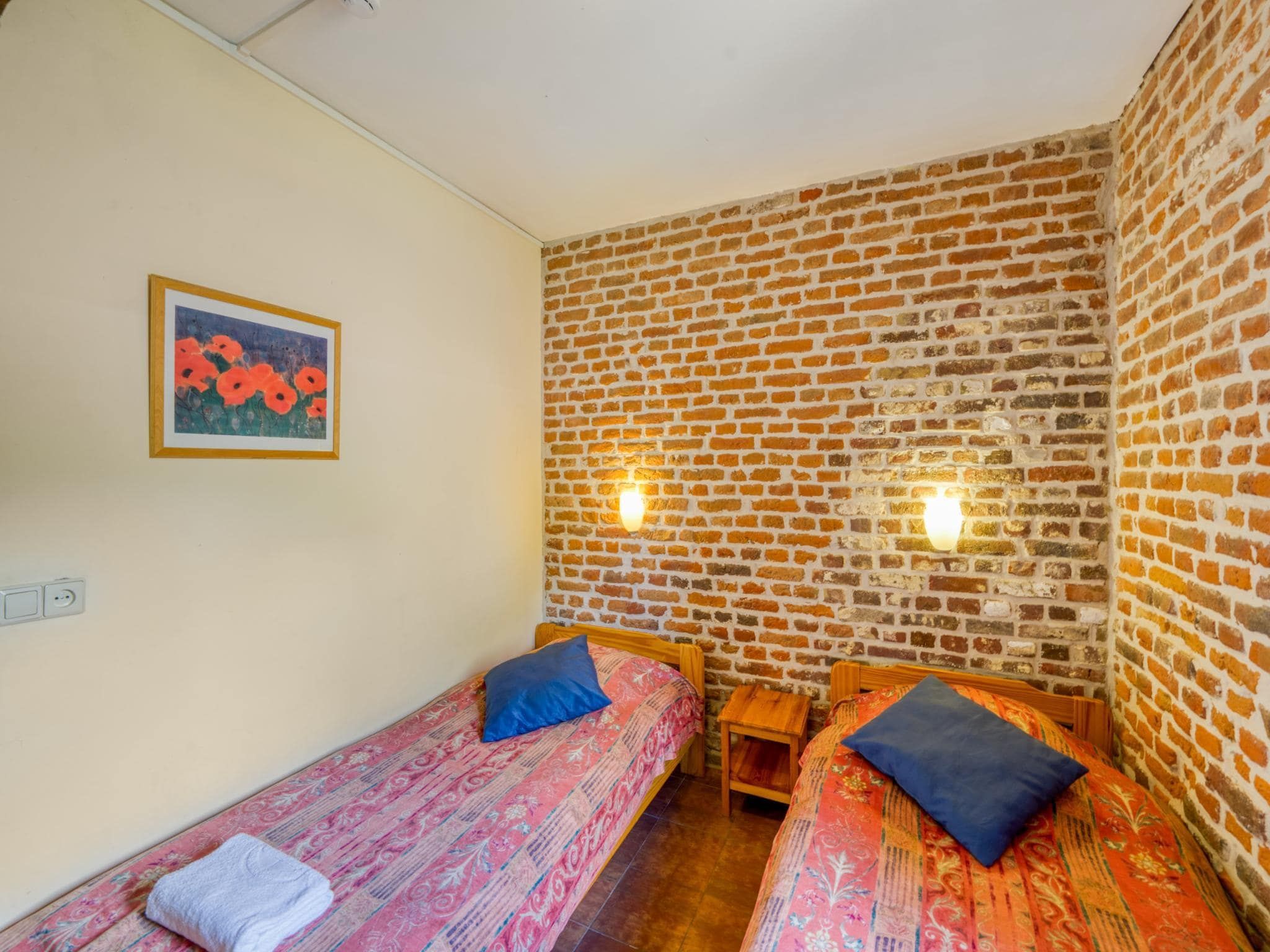 Een slaapkamer van Meschermolen 6 in Mesch-Eijsden