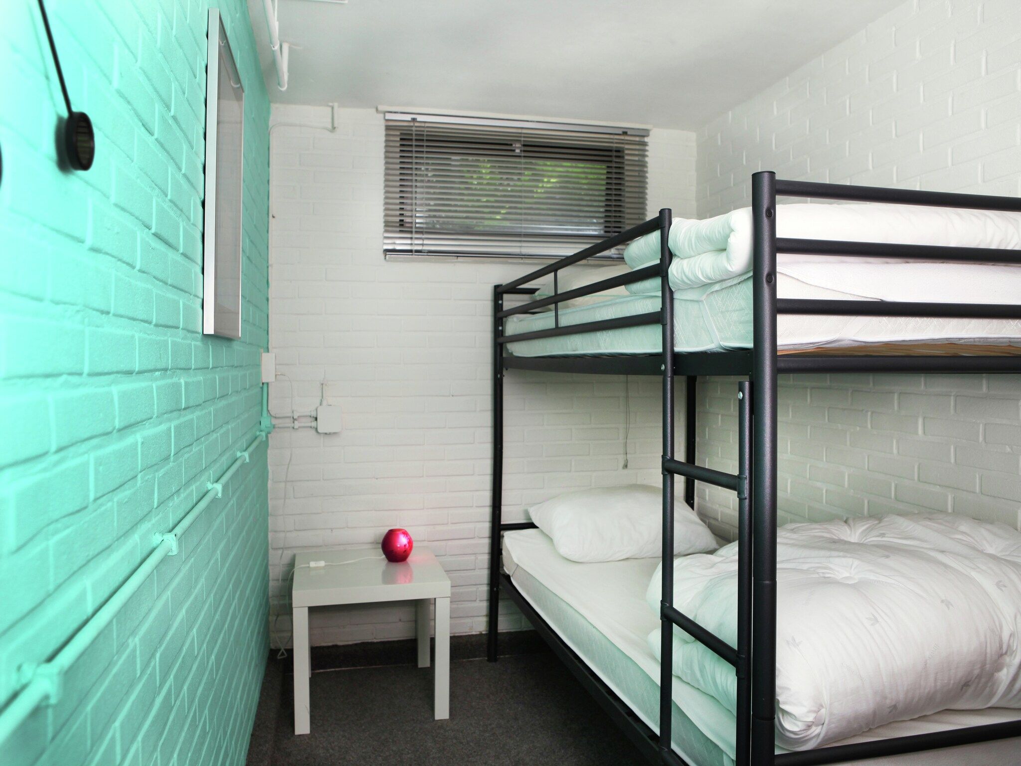 Een slaapkamer van De grove Den in Doornspijk