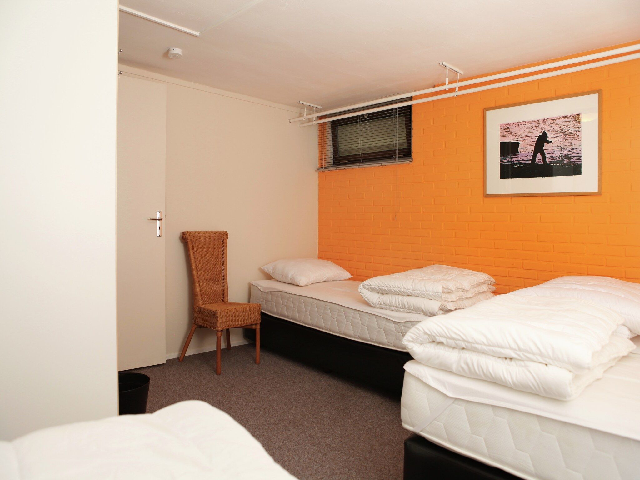 Een slaapkamer van De grove den in Doornspijk