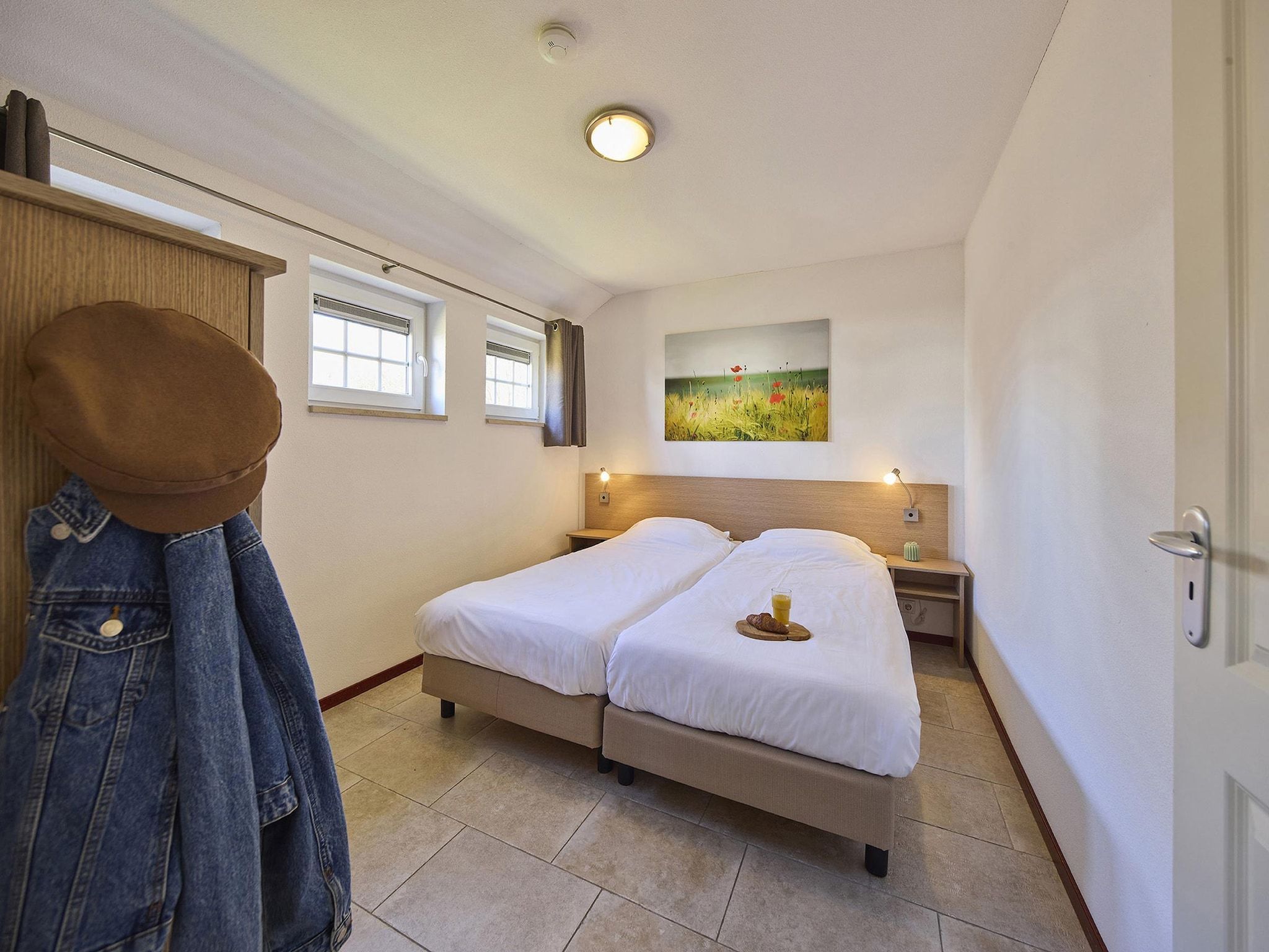 Een slaapkamer van Buitenhof De Leistert 17 in Roggel
