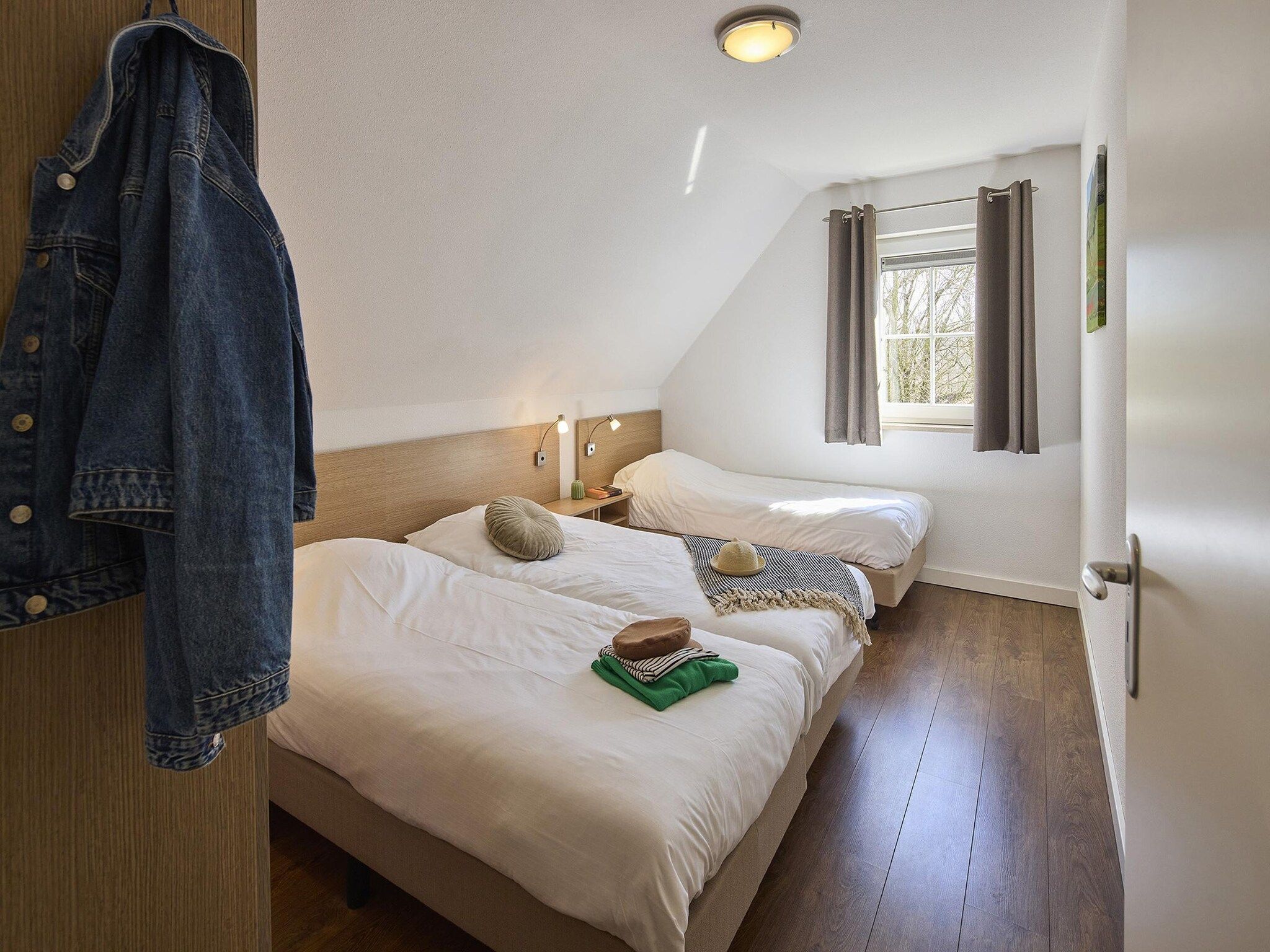 Een slaapkamer van Buitenhof De Leistert 17 in Roggel