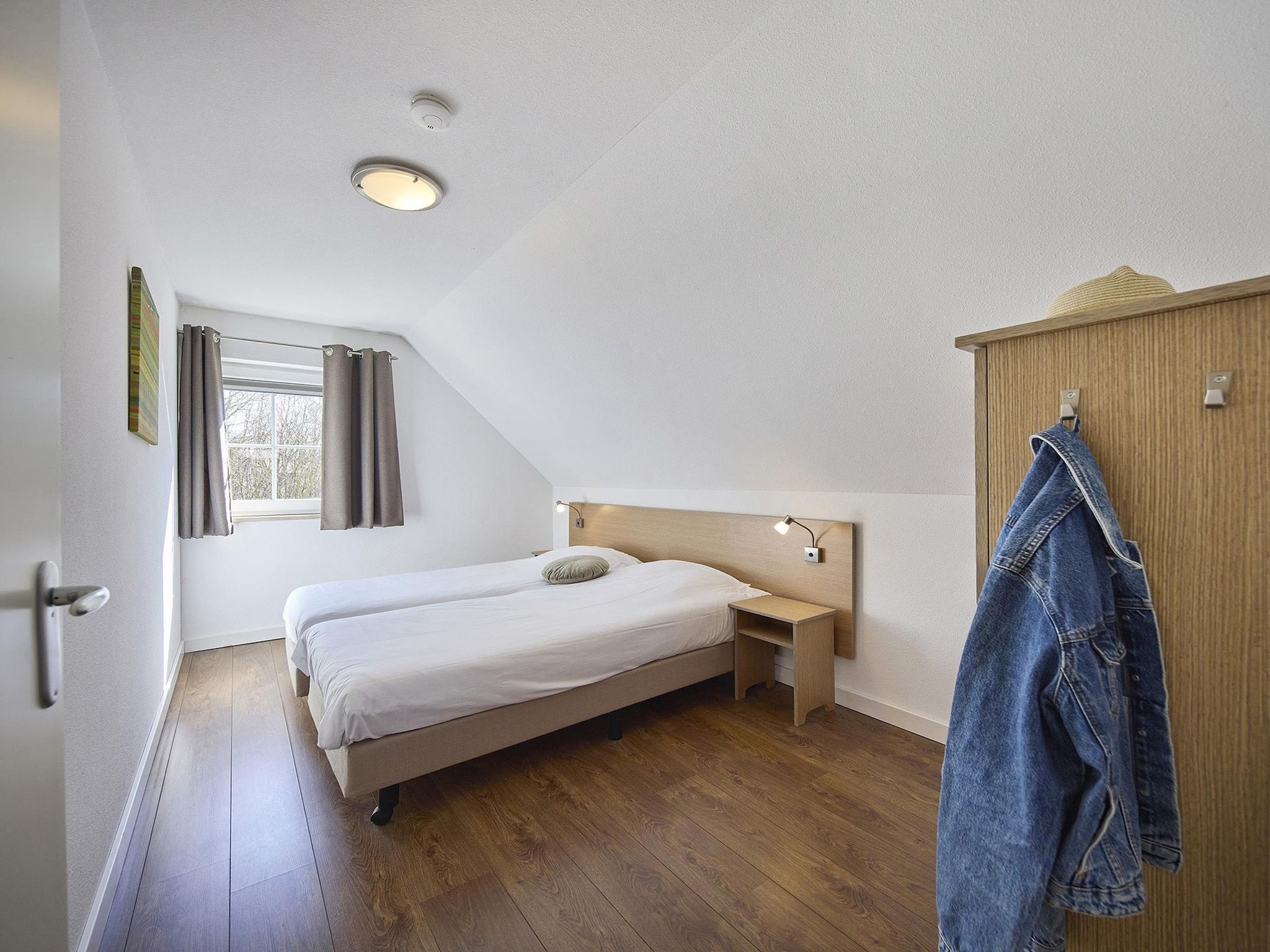 Een slaapkamer van Buitenhof De Leistert 11 in Roggel