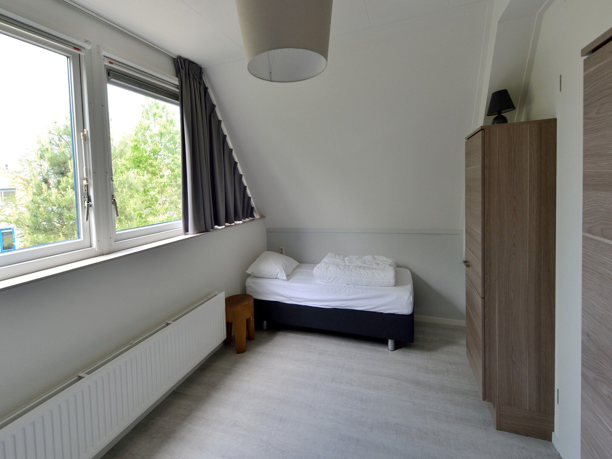 Een slaapkamer van Villapark Schildmeer 2 in Steendam