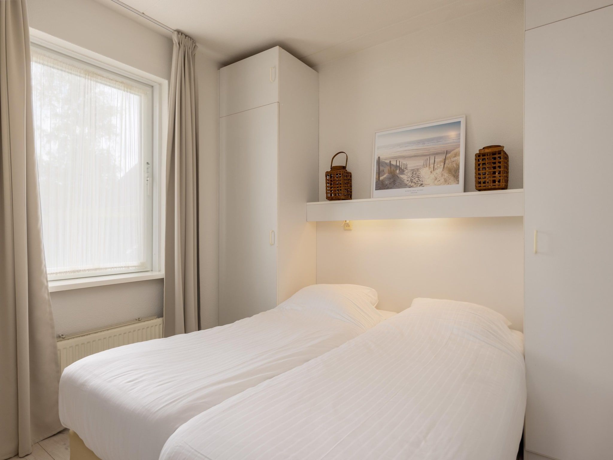 Een slaapkamer van Buitenplaats It Wiid 5 in Eernewoud