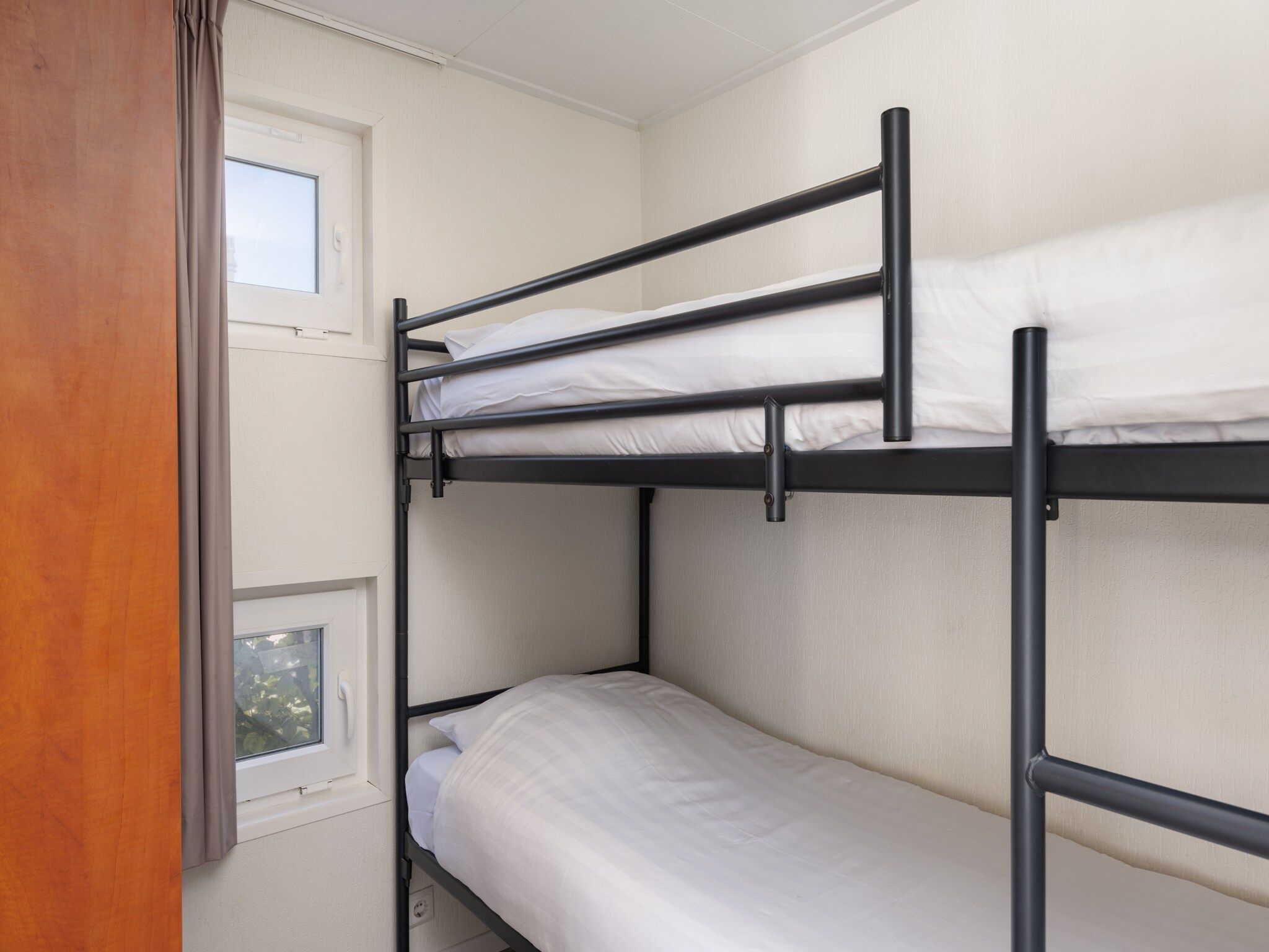 Een slaapkamer van Recreatiepark Tolplas 7 in Hoge Hexel