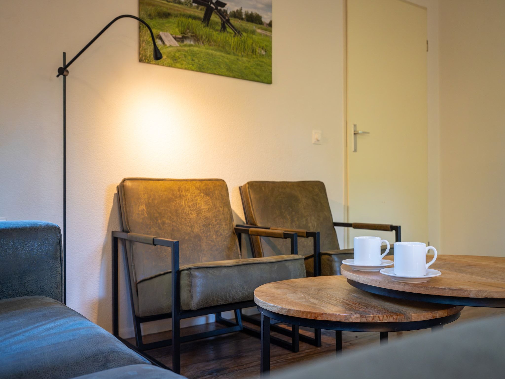 De woonkamer van Villapark De Weerribben 4 in Paasloo