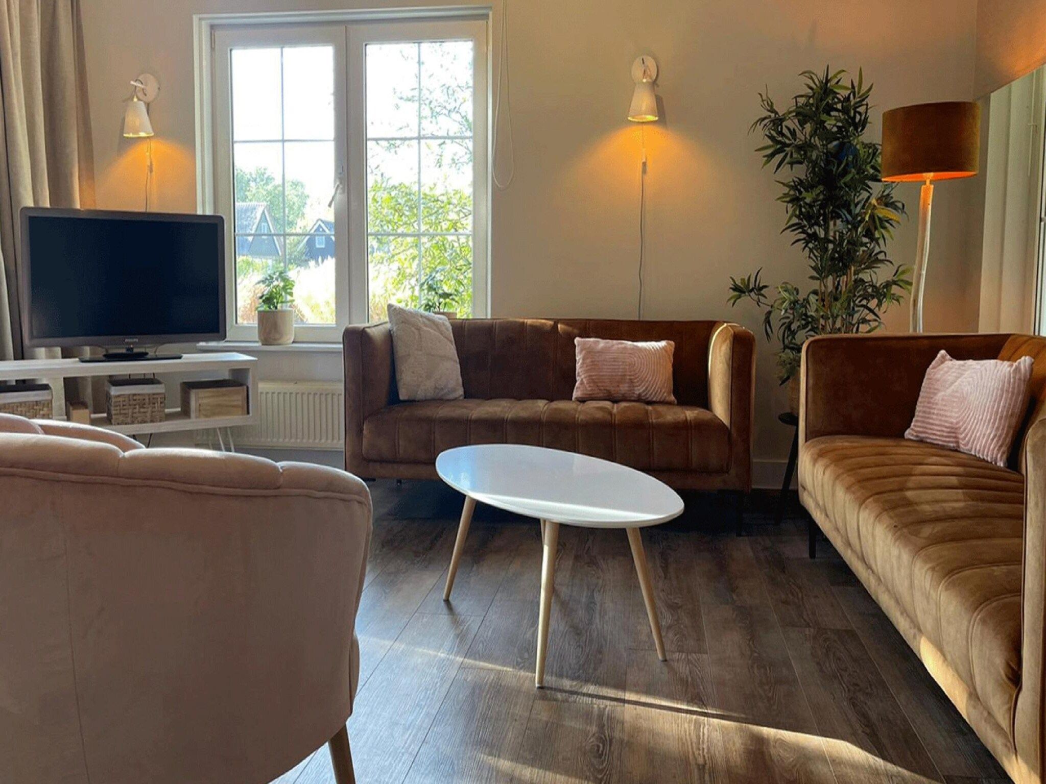 De woonkamer van Villapark De Weerribben 1 in Paasloo