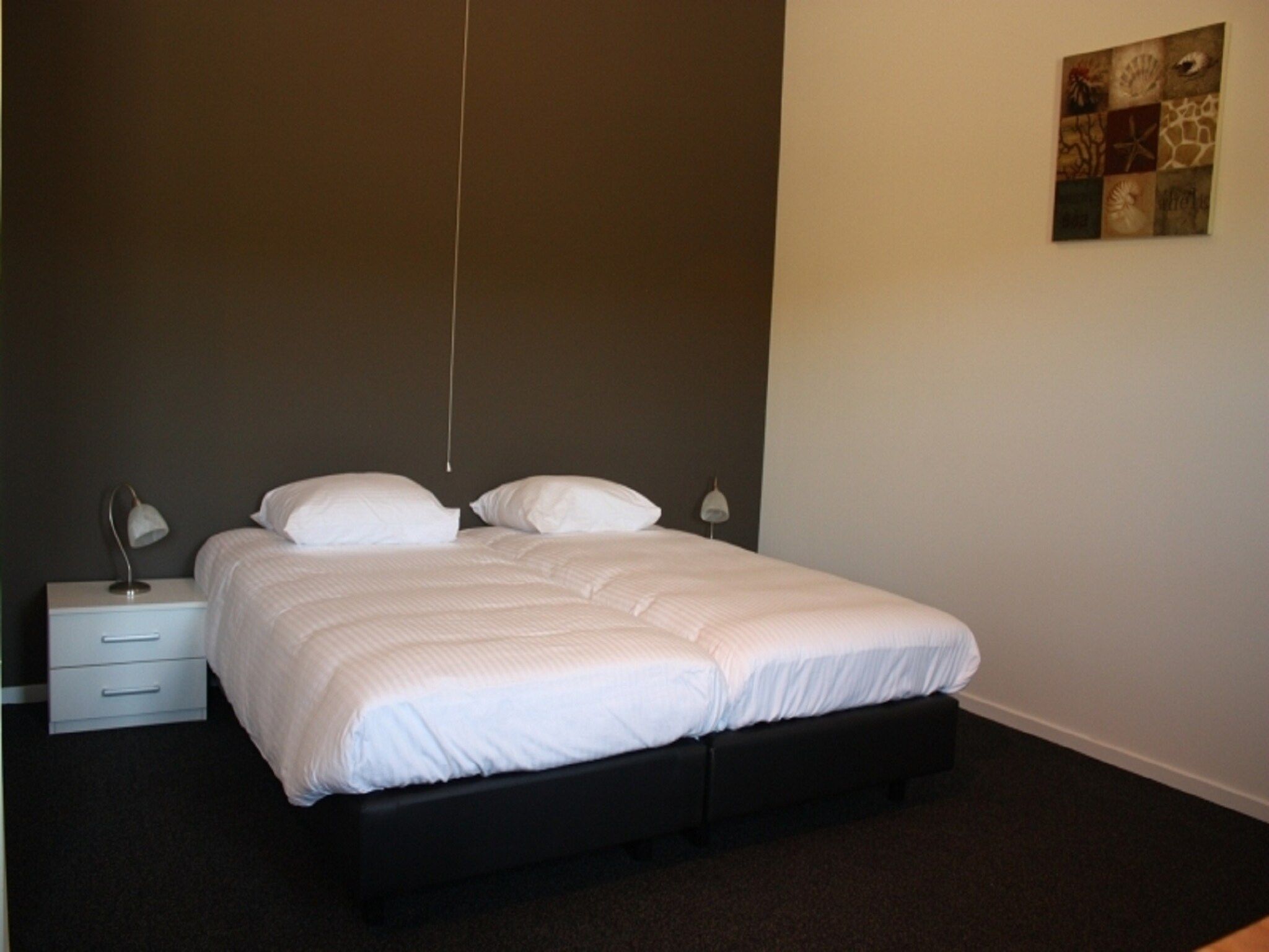 Een slaapkamer van Recreatiepark de Stelhoeve 2 in Wemeldinge
