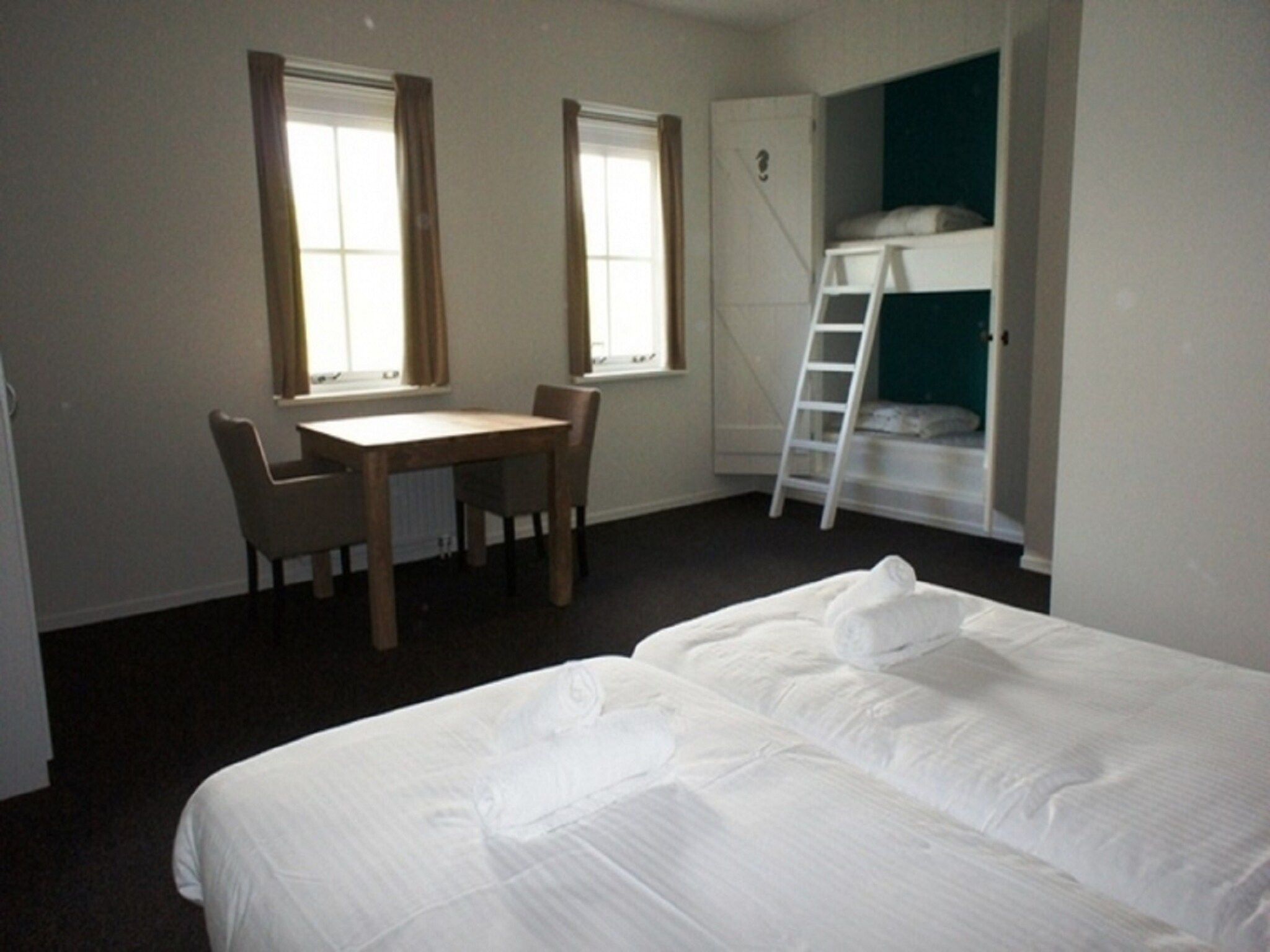 Een slaapkamer van Recreatiepark de Stelhoeve 2 in Wemeldinge