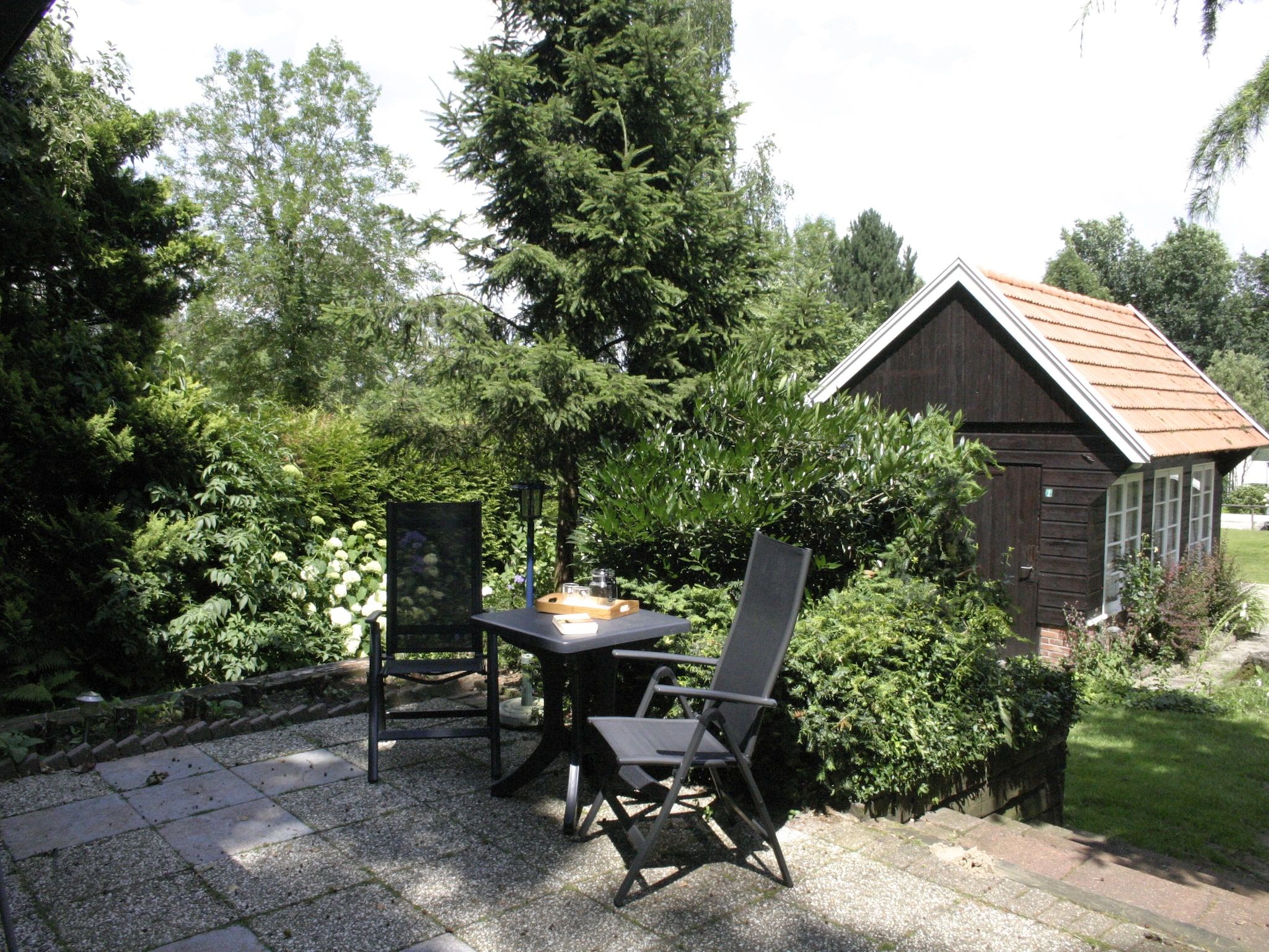 De tuin van Chaletpark Kuiperberg 7 in Ootmarsum