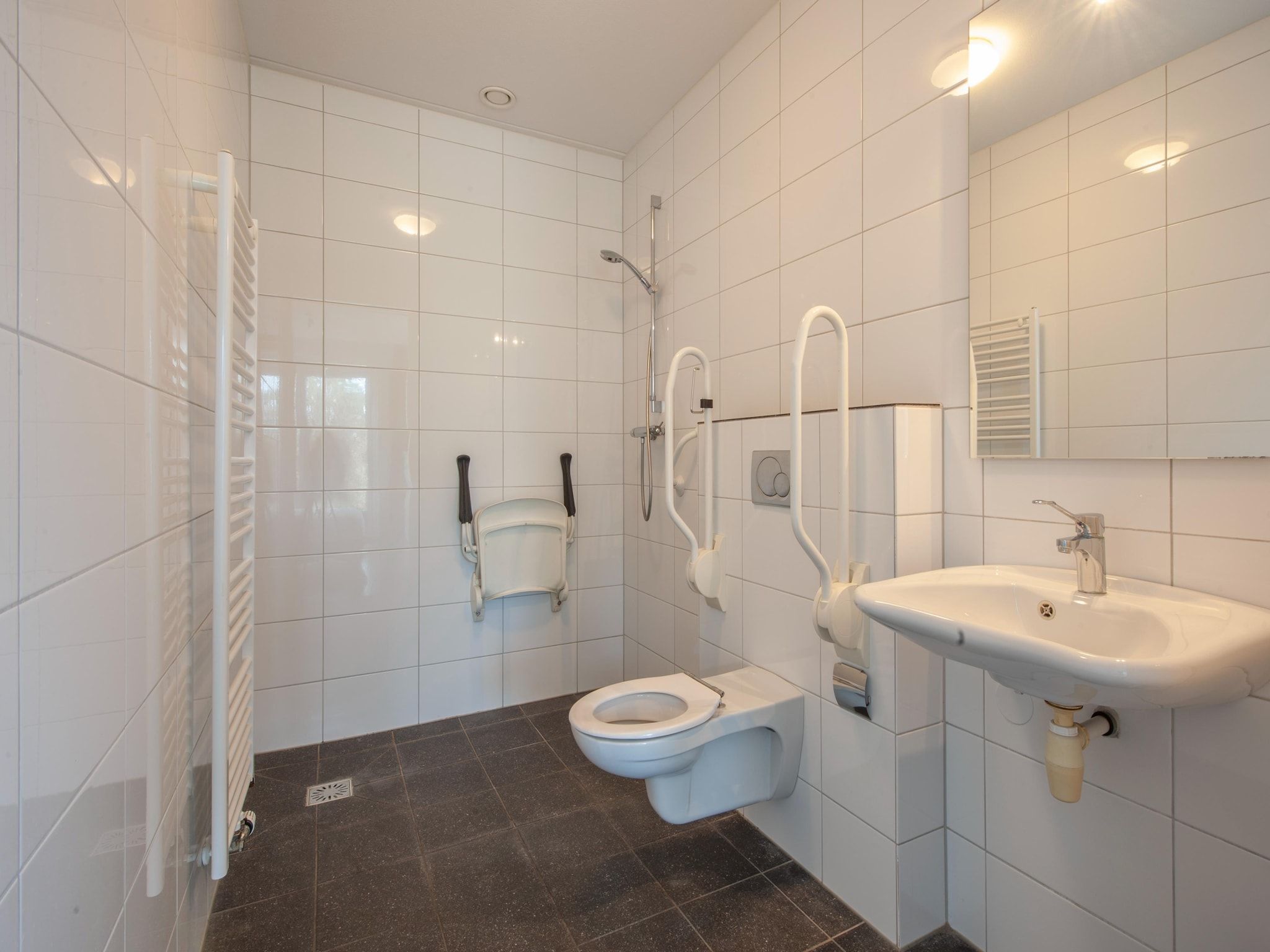 De badkamer van Resort Arcen 3 in Arcen