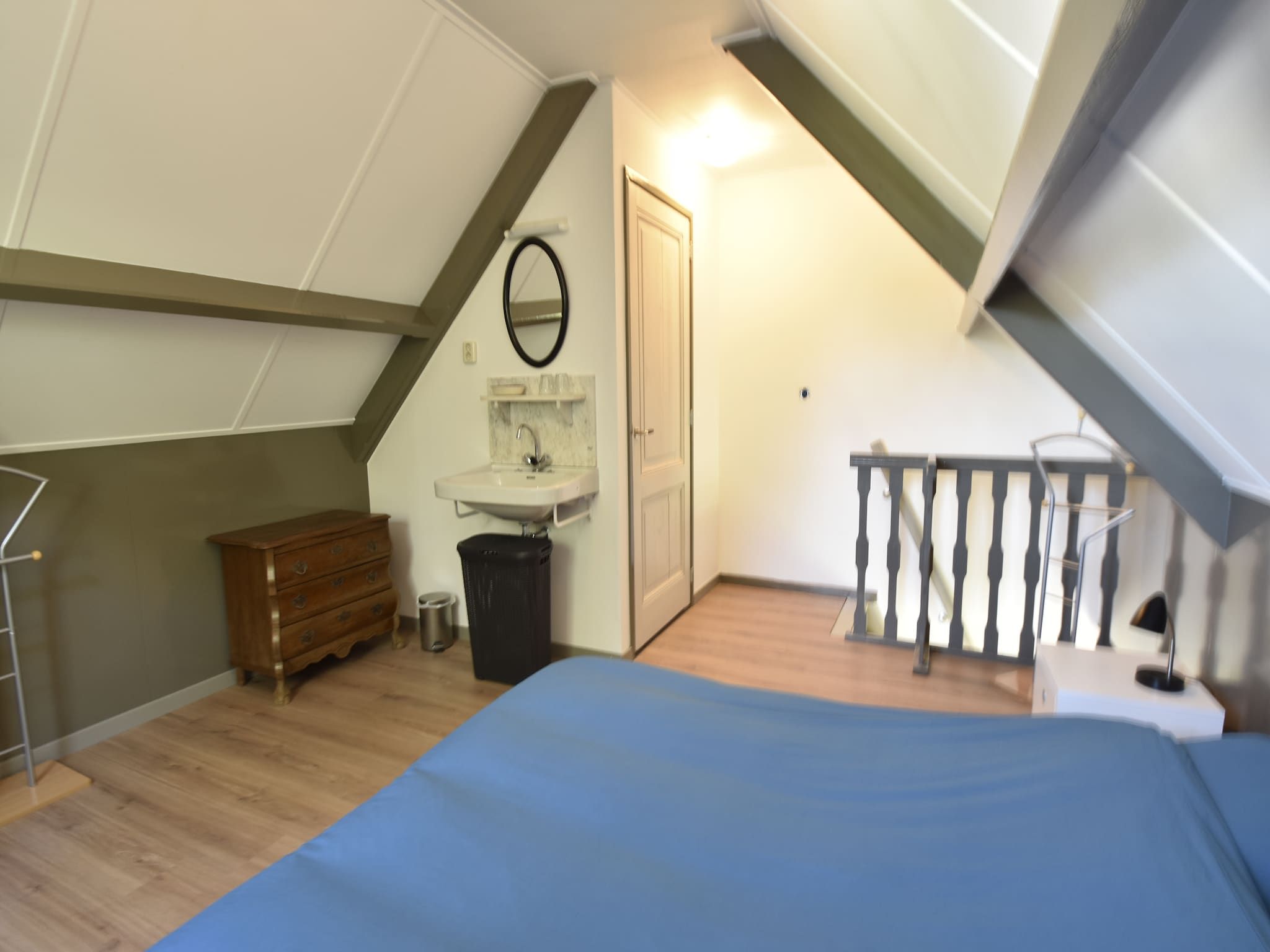 Een slaapkamer van Harrekidee in Sint Maartensbrug