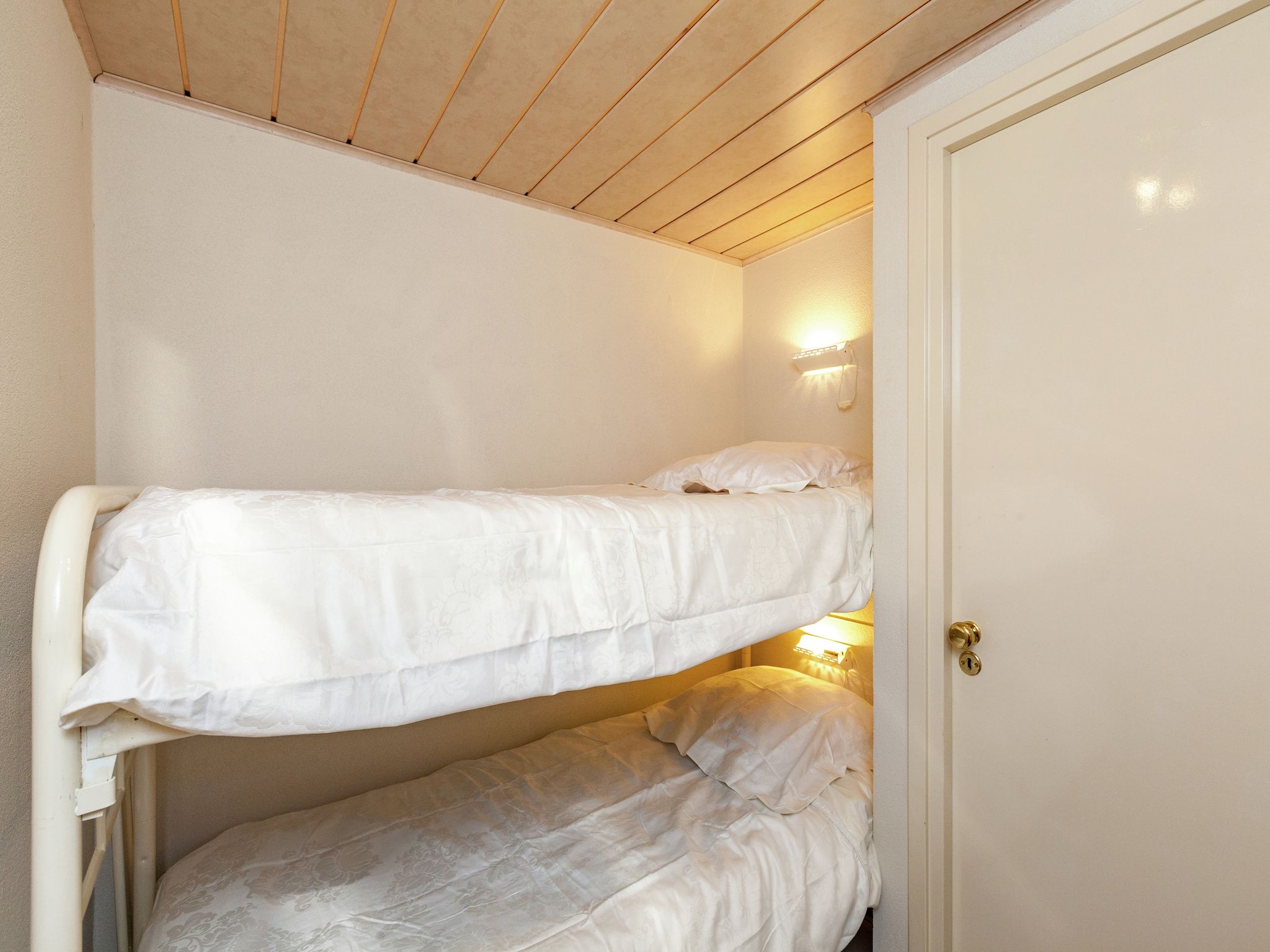 Een slaapkamer van Vier Duinen in Oostkapelle