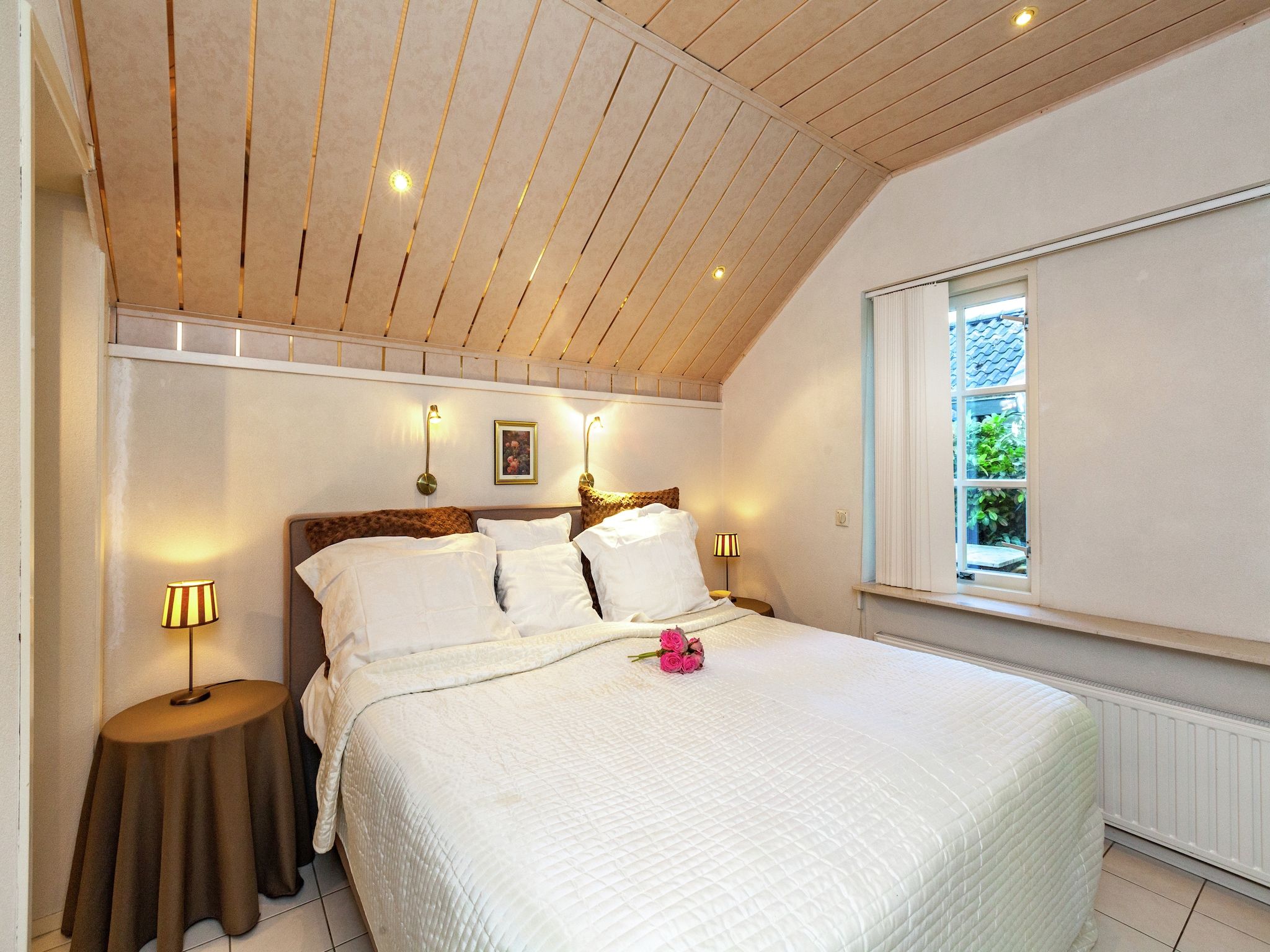 Een slaapkamer van Vier Duinen in Oostkapelle