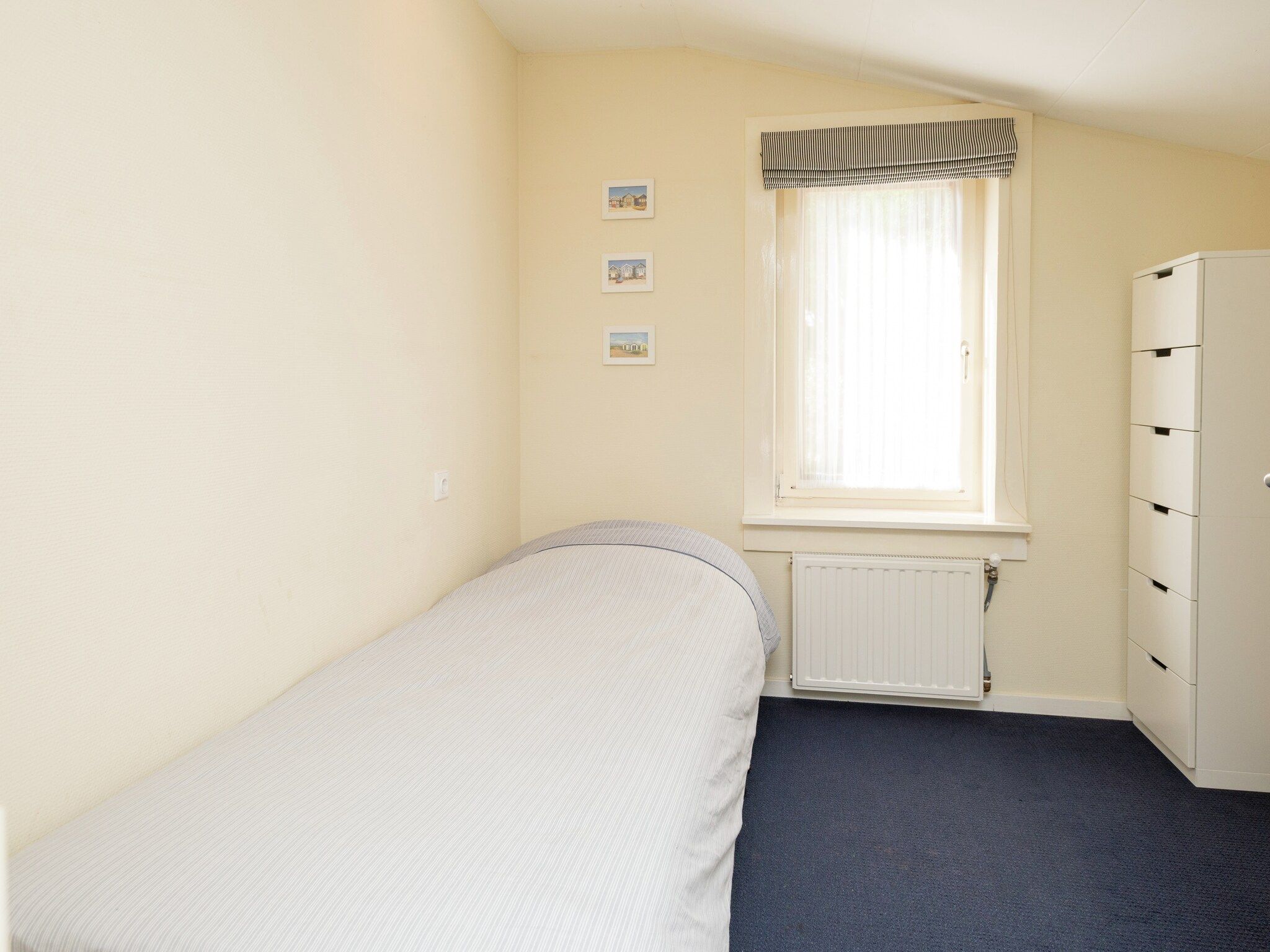 Een slaapkamer van De Strandvogel in Julianadorp