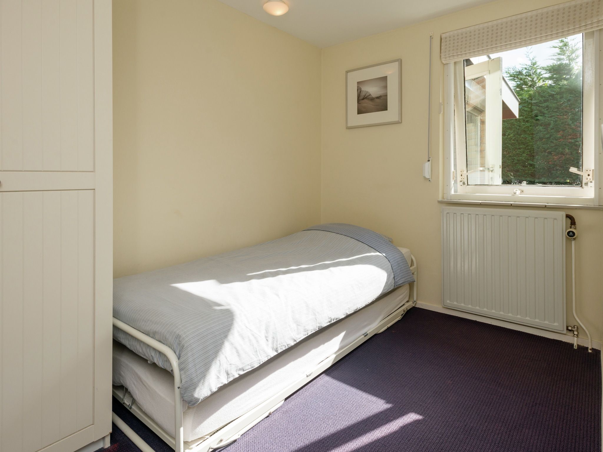 Een slaapkamer van De Strandvogel in Julianadorp