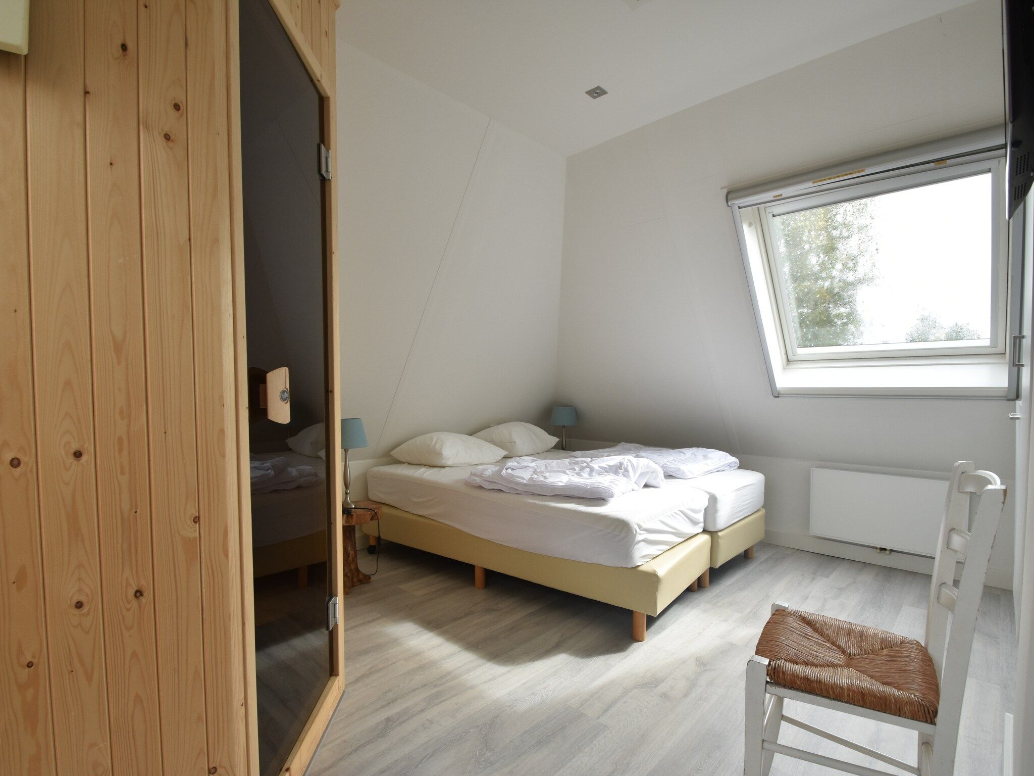 Een slaapkamer van Wellness aan het Water in Eernewolde in Earnewald